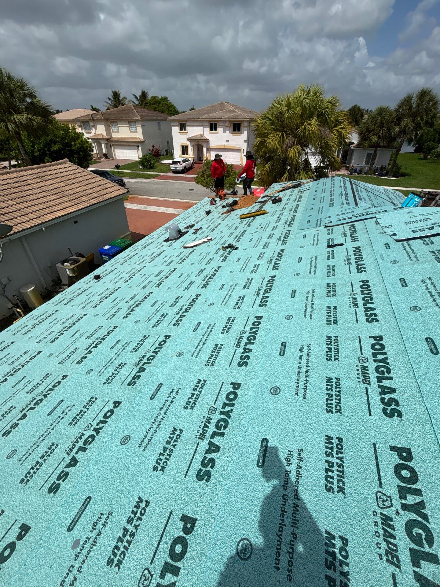 Concrete Barrel Tile Roof Replacement with Polyglass Underlayment in Miramar by Art's Roofing & Construction