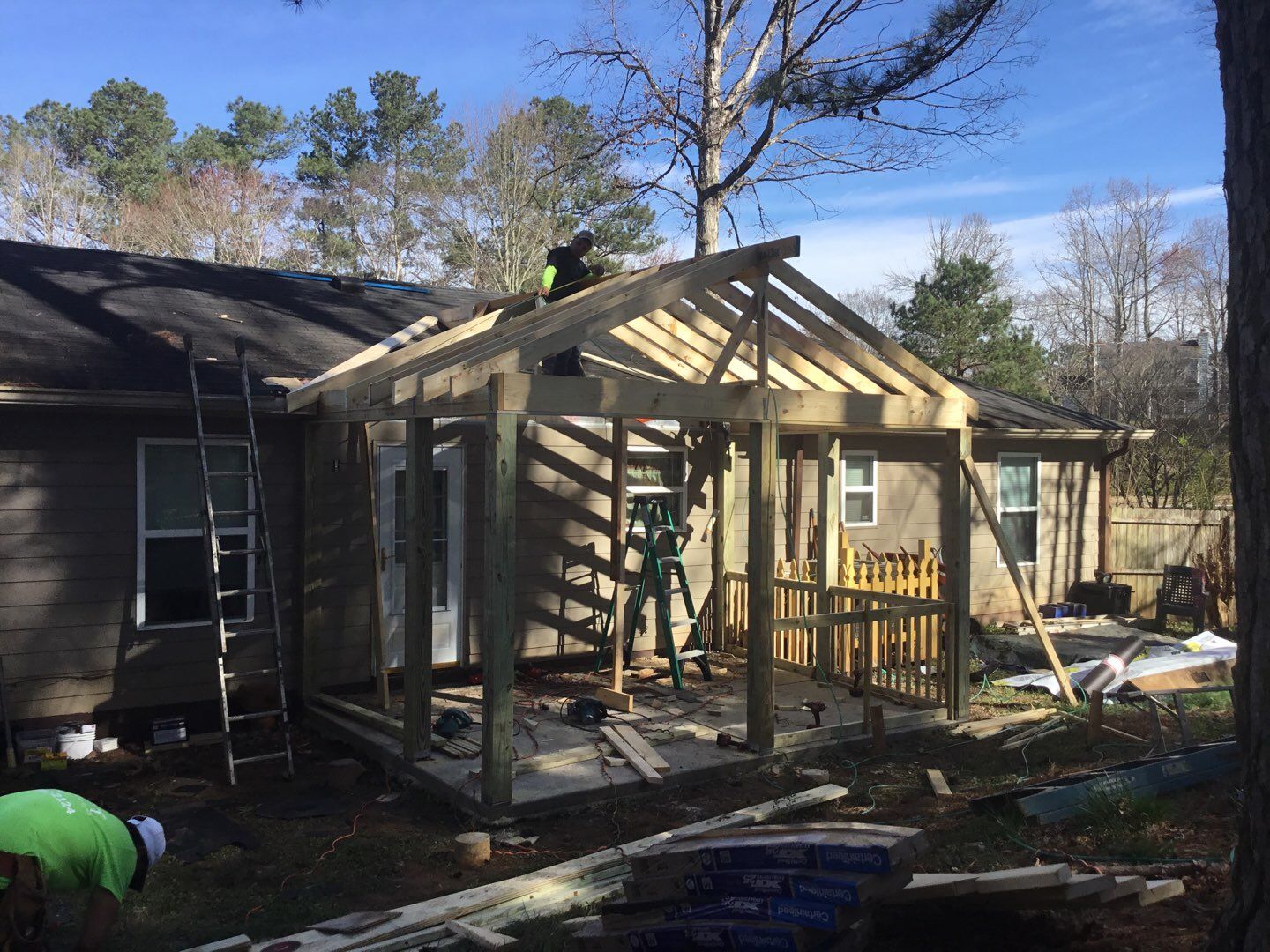 Screened Porch Construction with Vaulted Wood Ceiling in Douglasville by Swift Home Renovations