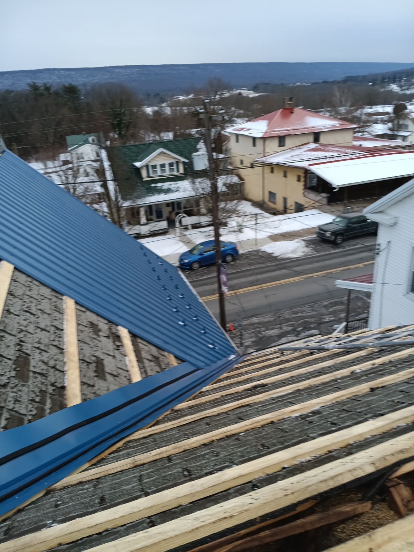 Gallery Blue ABM Panel Metal Roof Installation in Tower City by Esh Builders