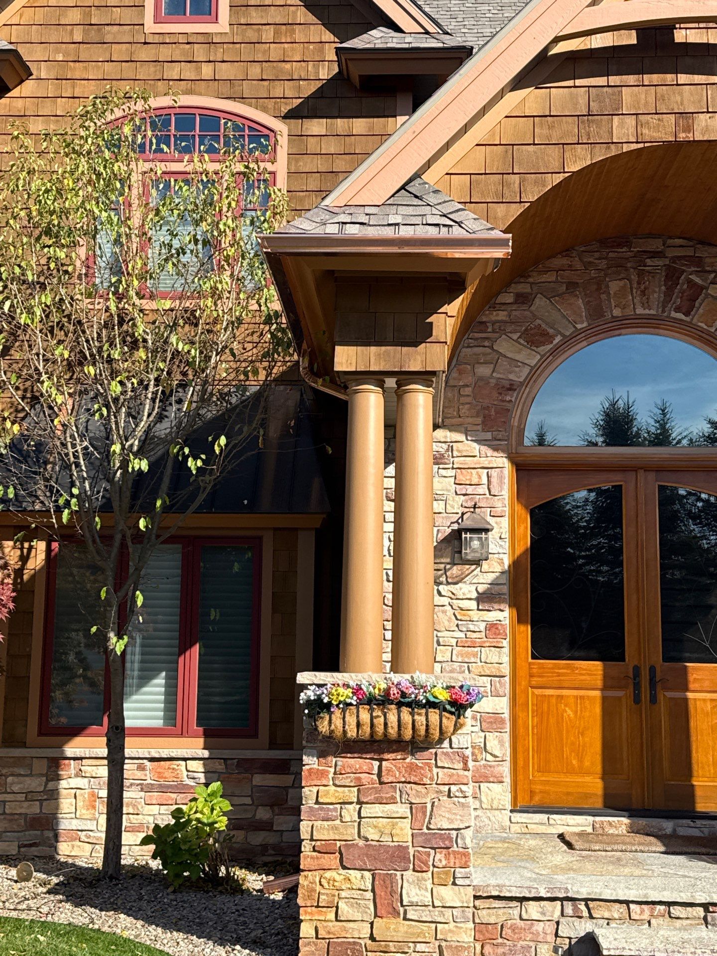 Custom Copper Gutter and Metal Downspout Installation in Williamsburg by Rainbow Seamless Systems