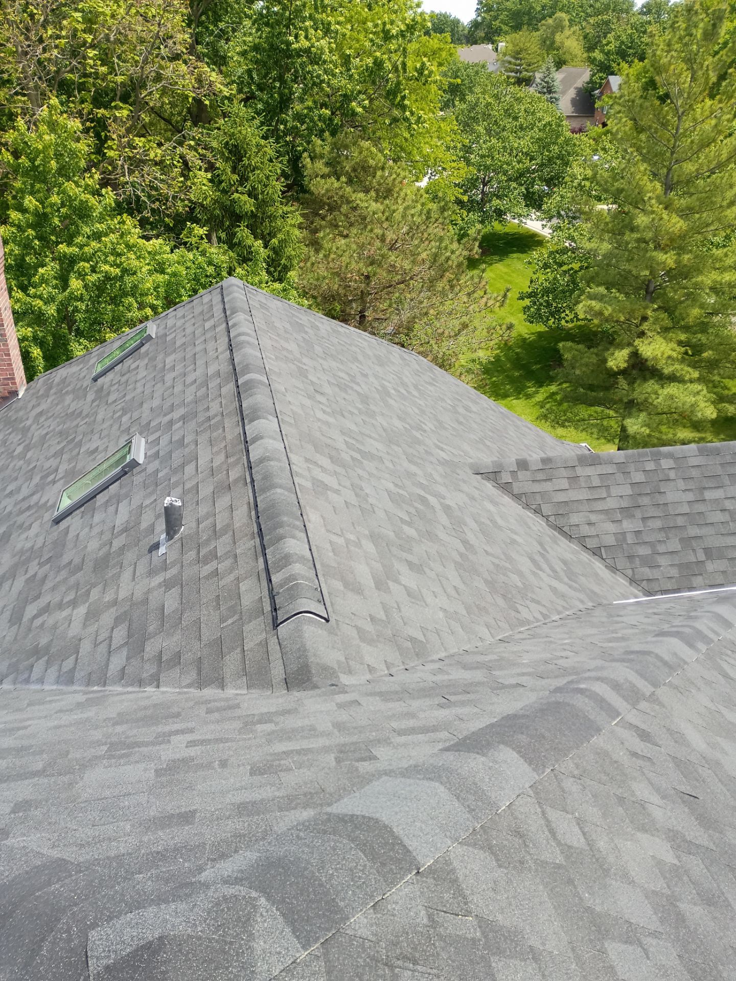 Asphalt Shingle Roof Replacement and Skylight Installation in Darien by Pro Home Services Inc