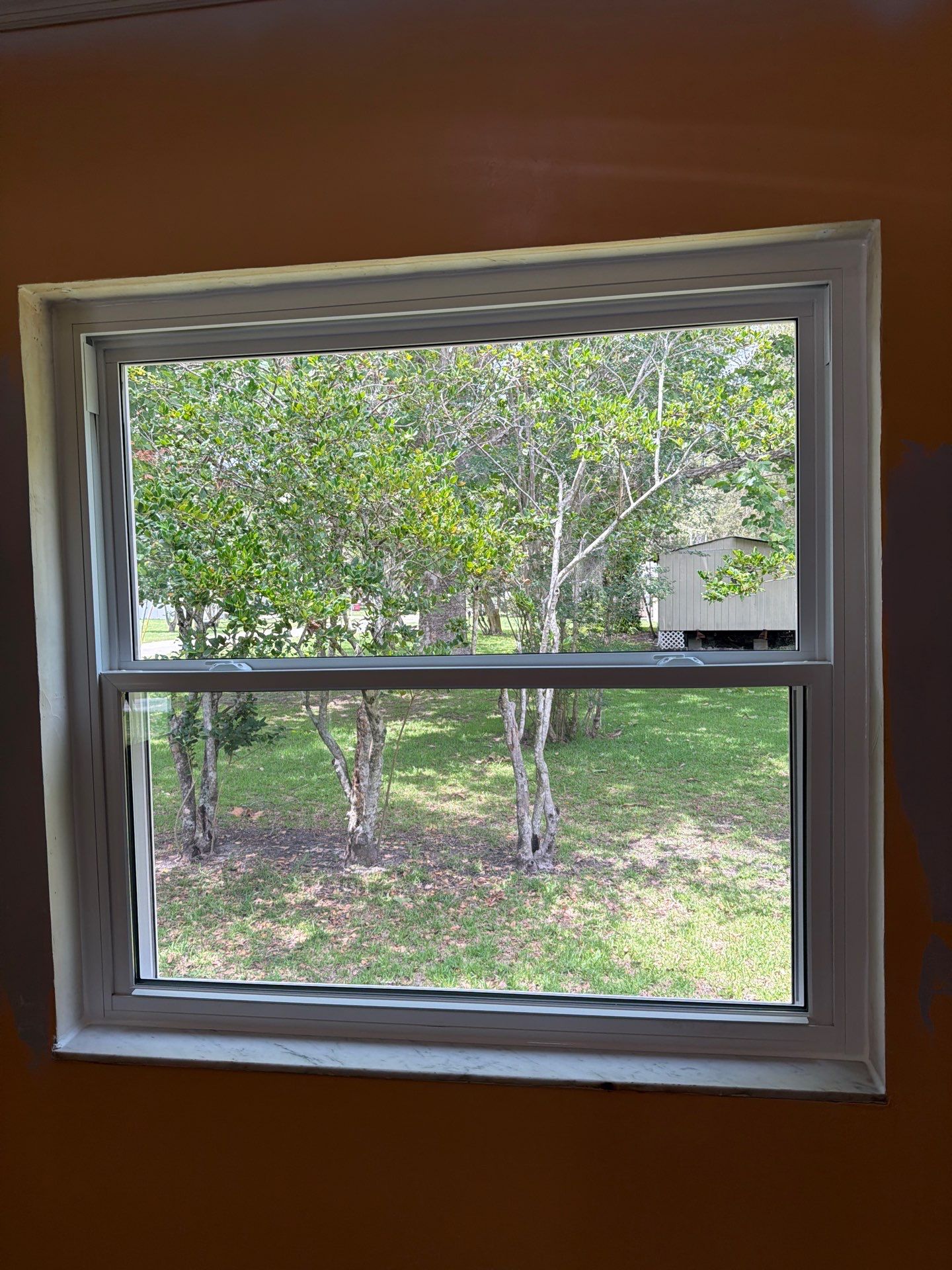 White Vinyl Window Replacement for Residential Home in Williston by Windows & Doors Store