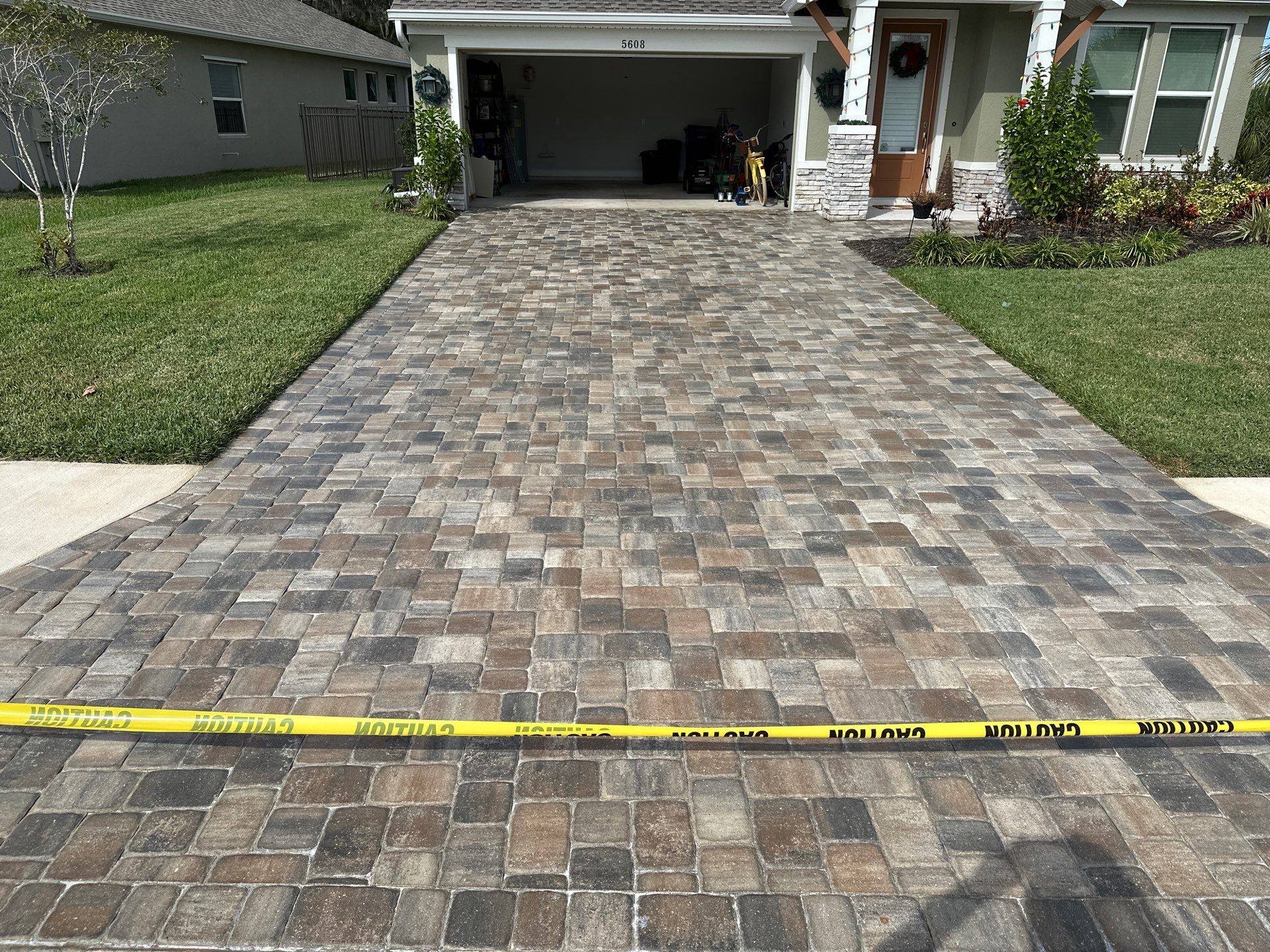 House Wash, Paver Driveway & Sidewalk Cleaning + Sanding & Sealing in Trevesta Community, Palmetto, FL by Sunshine AquaWash