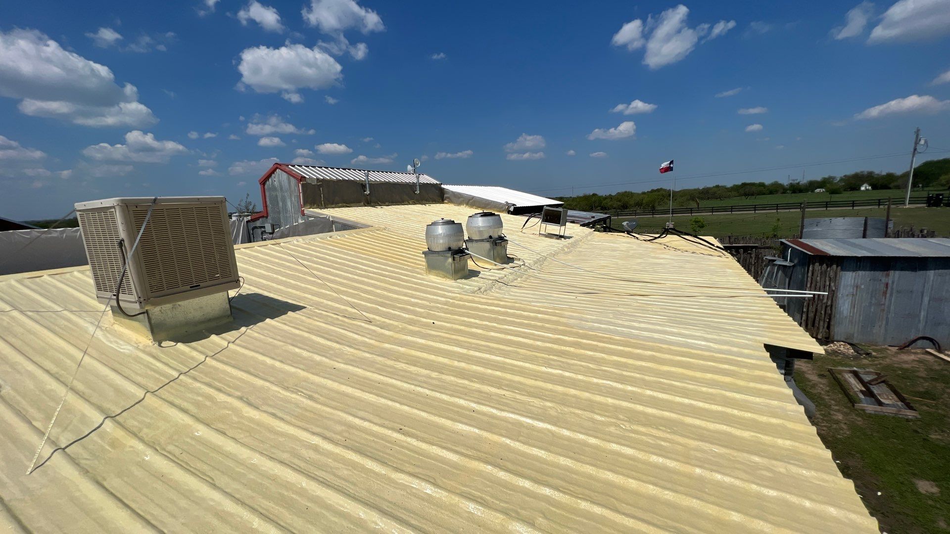 Commercial Roofing Repair using TRP #924 Eterna-Sil Premium Silicone Roof Coating by Harvey Roofing & Construction