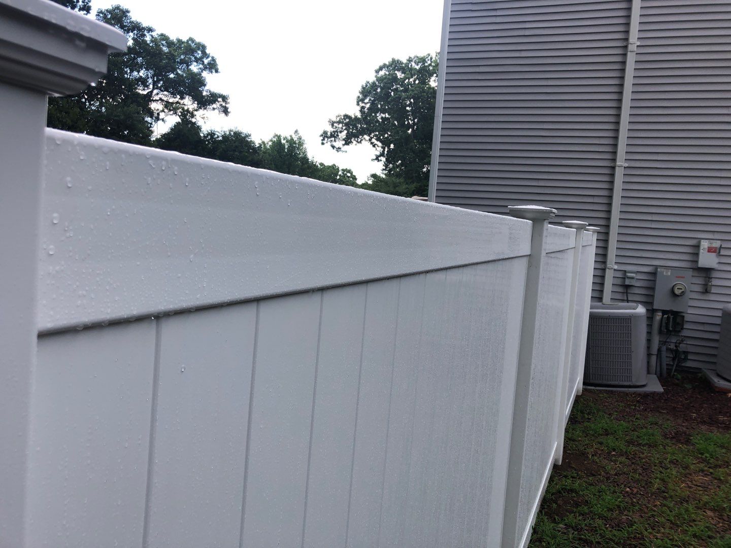 Vinyl Privacy Fence, White  by DiGiorgi Roofing and Siding Inc