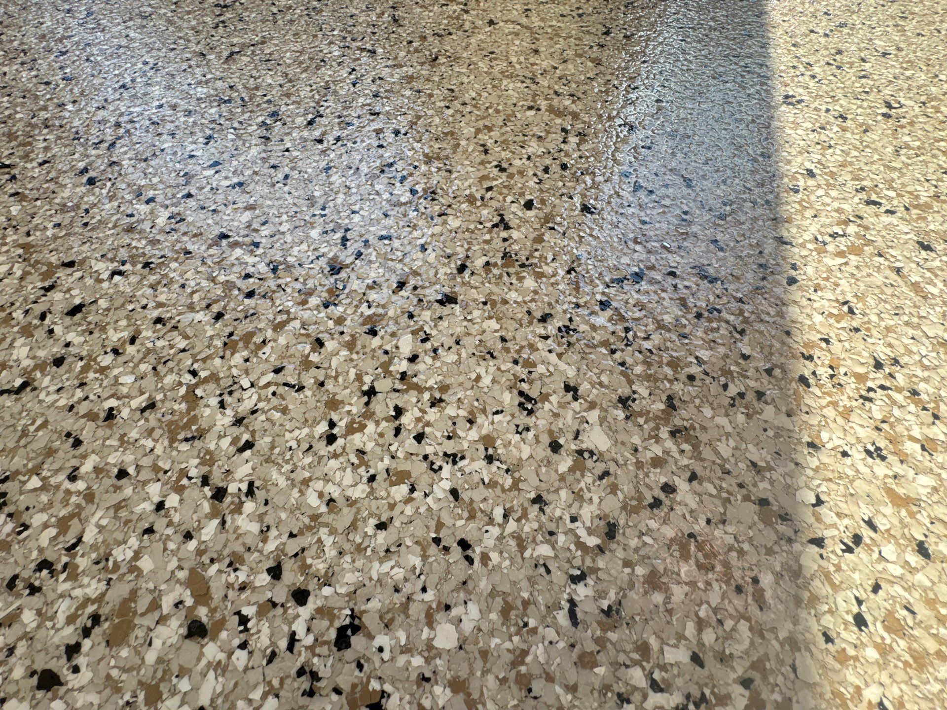 Driftwood Flake Garage Floor Transformation in Coeur d'Alene by Croc Coatings, LLC