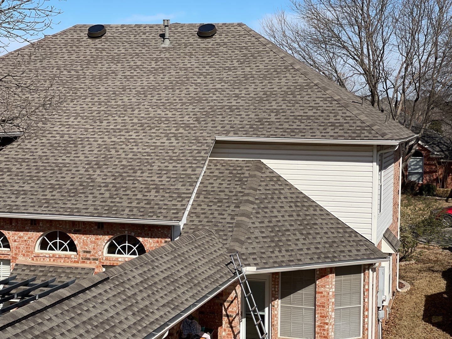 Major storm damage required full roof replacement along with other exterior repairs by First United Roofing & Construction