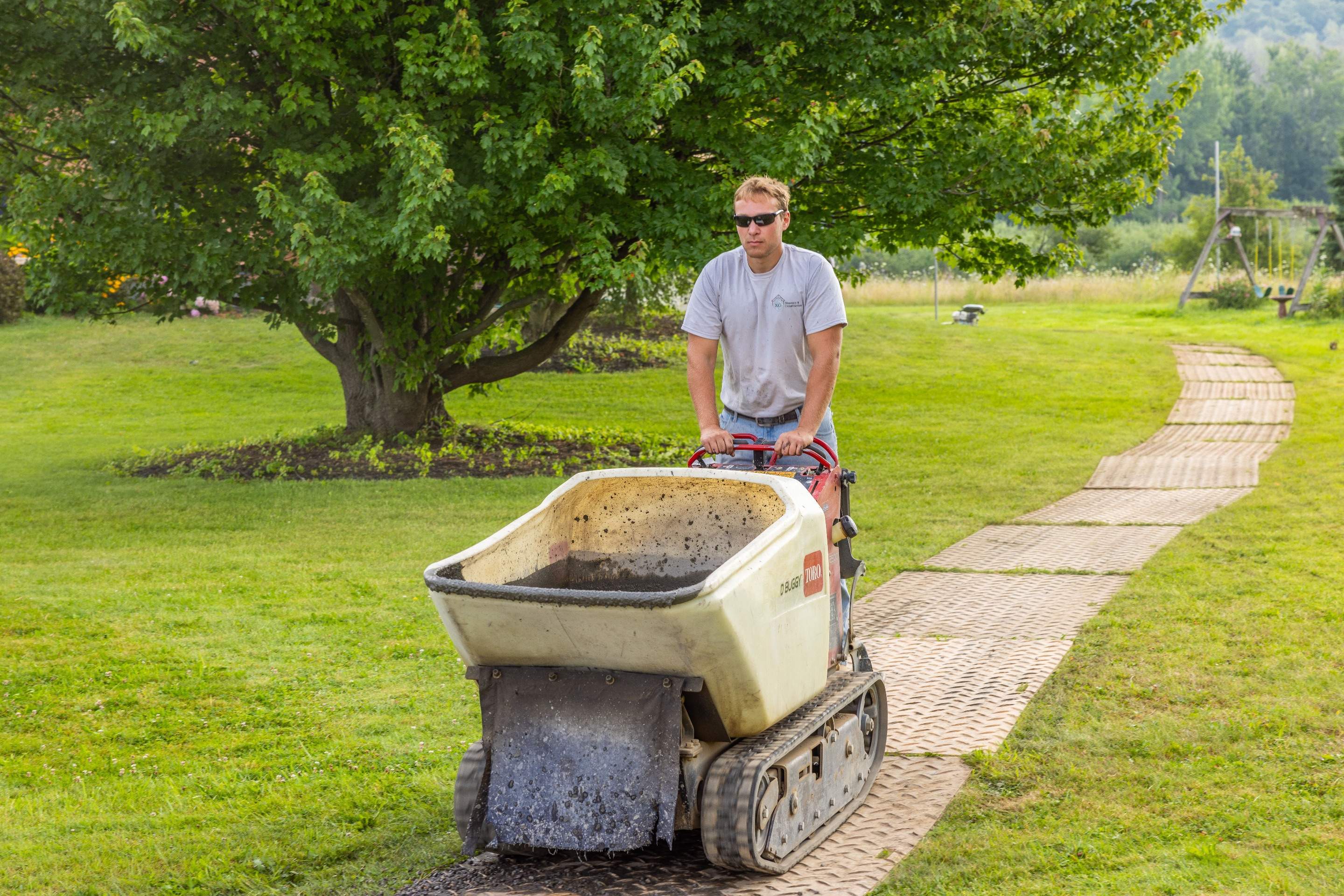 Bluestone textured concrete stamped patio  by NG Masonry & Construction LLC