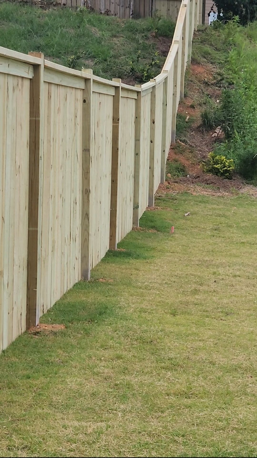 Fence Installation of Capped Wood Privacy by Titans of Timber Fence & Stain