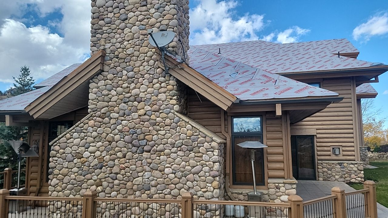 Standing Seam Metal Roof Replacement After Snow Damage by ASAP Roofing & Restoration