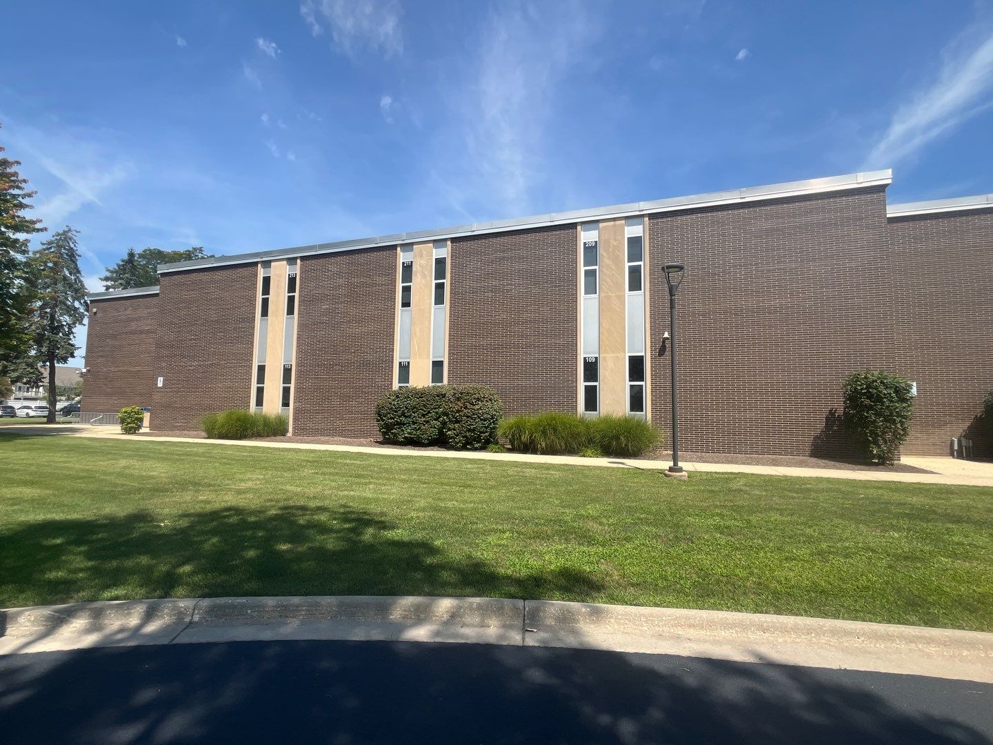 commercial pressure washing using Algaecide, soft wash soap by Northern Power Washing LLC.