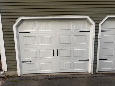Clean Garage Door Upgrade with Modern Hardware Detail