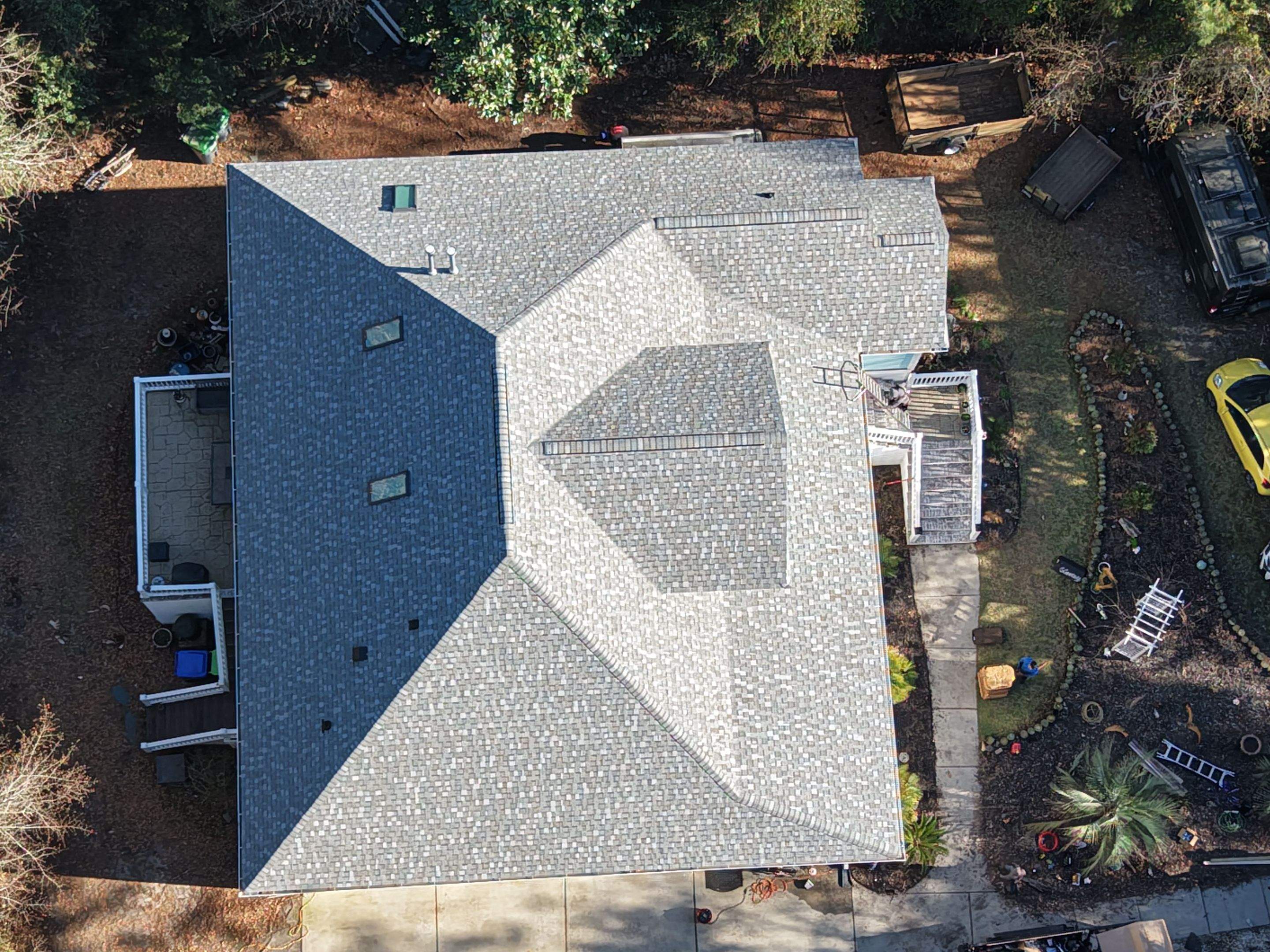Indigo Plantation Southport NC Fortified Roof Replacement Southport NC CertainTeed Landmark Pro Cobblestone Gray Skylight Installation by RGR Construction and Roofing, LLC