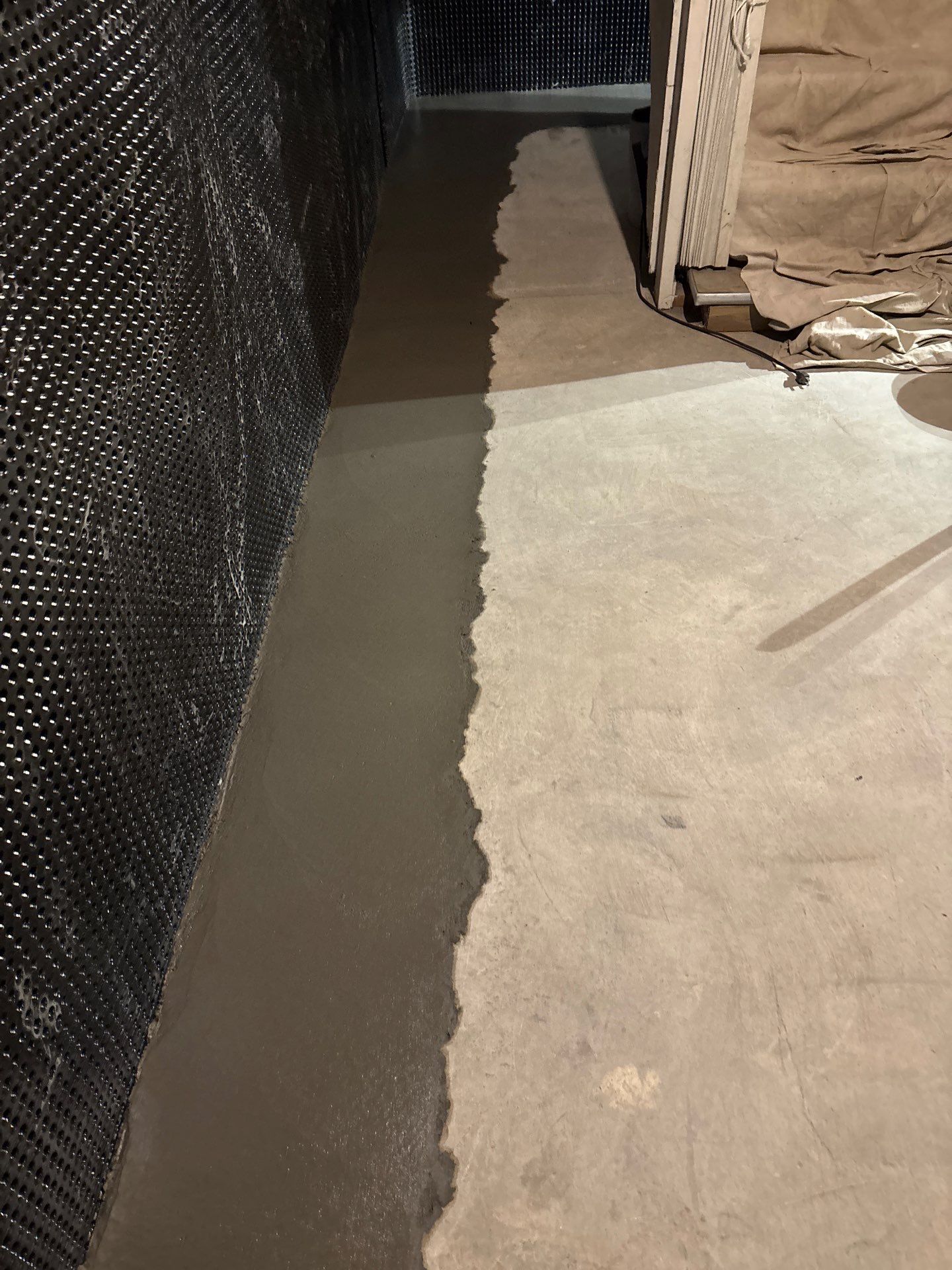 Interior Drain Tile & Buried Discharge in South Minneapolis by Waterproofing Northeast