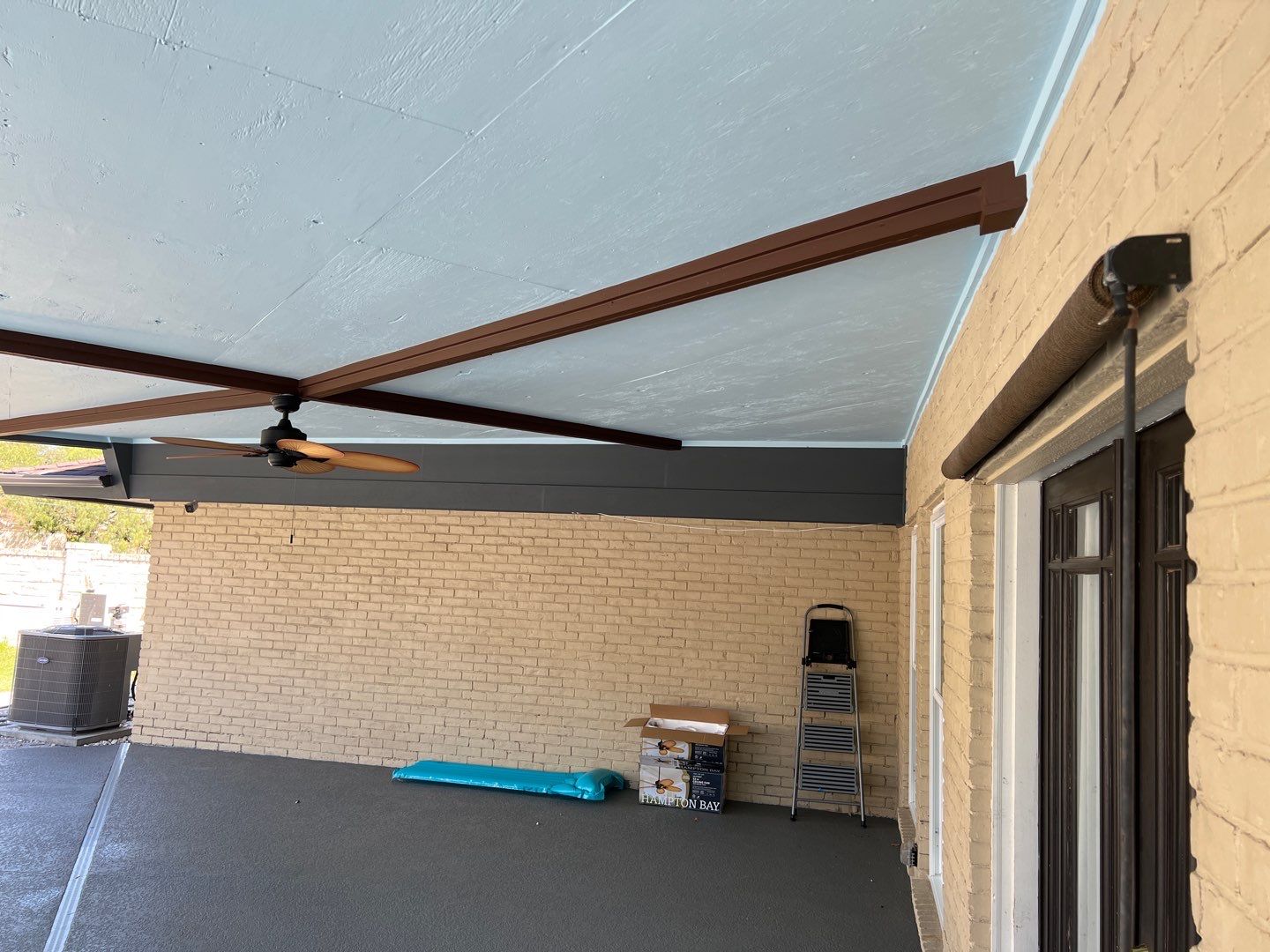 Beautiful pool side build by Bayfront Roofing and Construction
