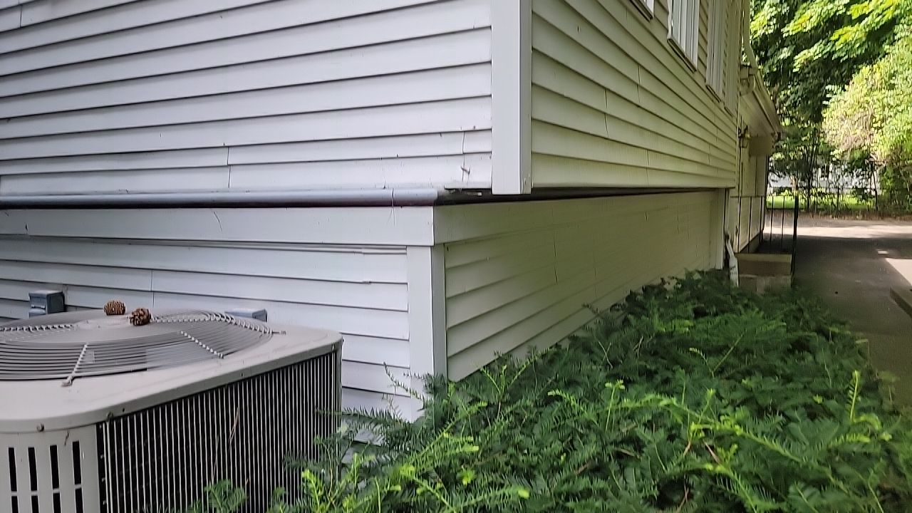 Housewashing  using Algaecide, soft wash soap by Northern Power Washing LLC.