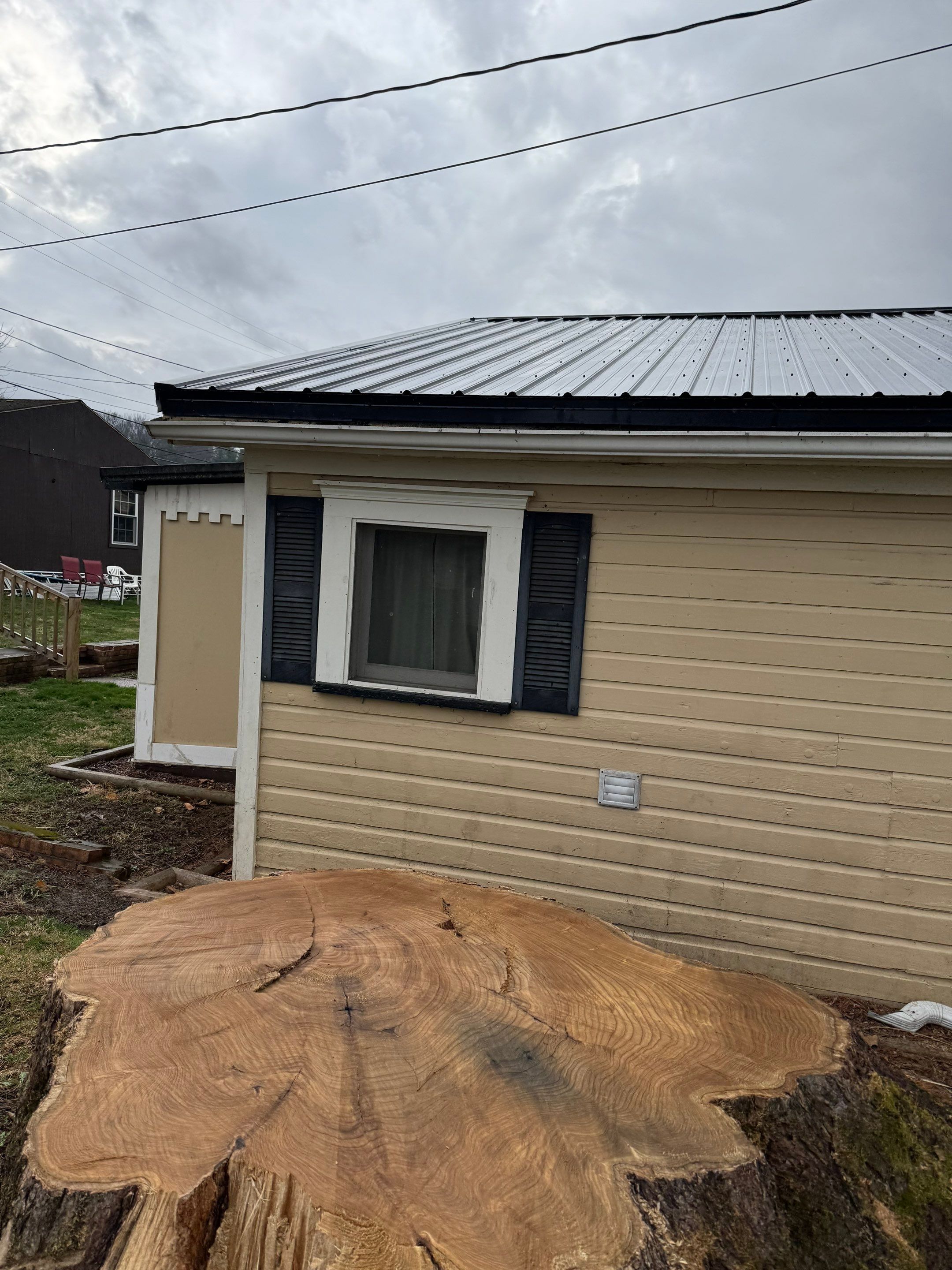 Vinyl Window Replacement and Black Shutter Installation in Dennison by Ohio State Windows