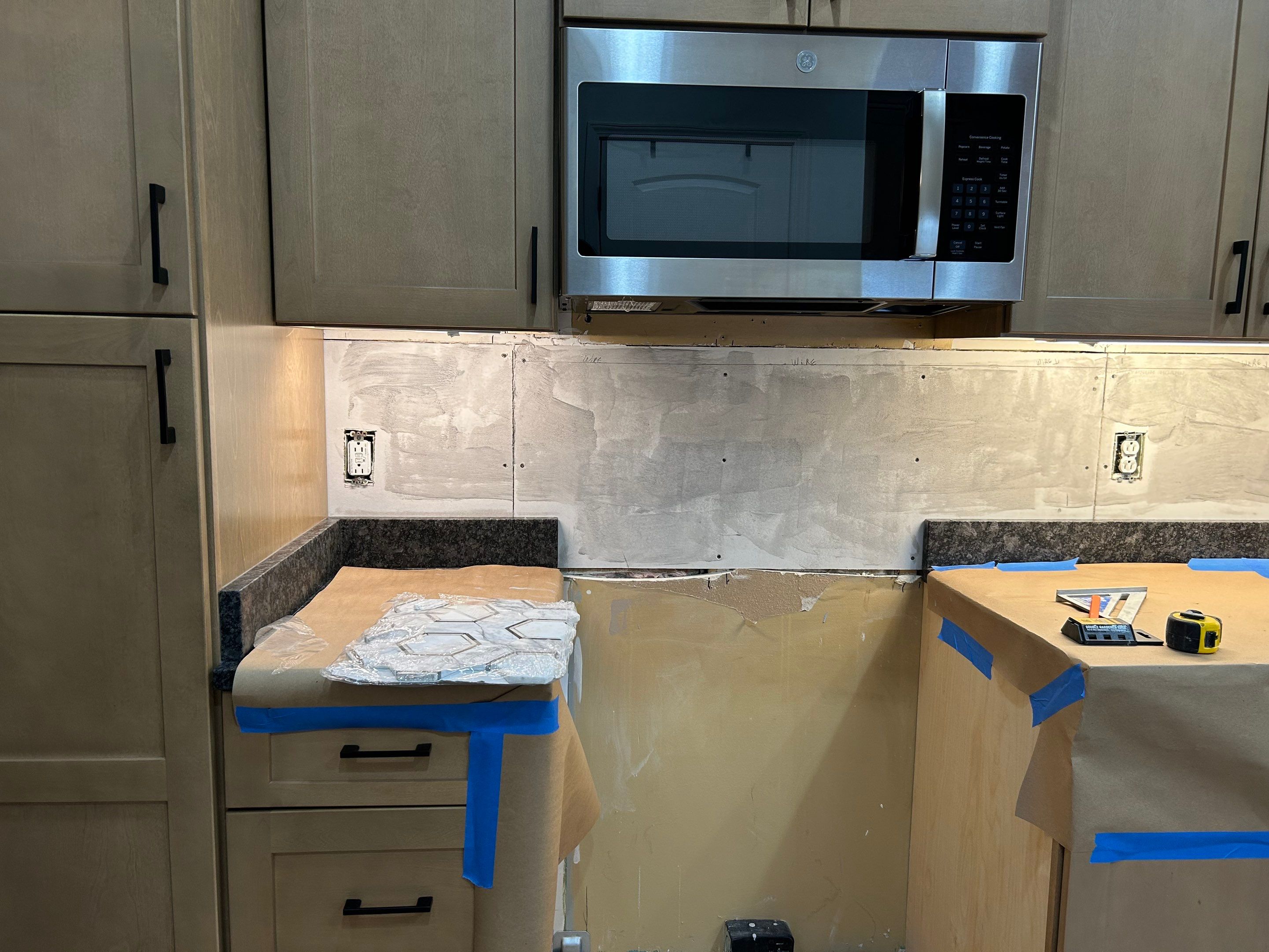 Hexagonal Marble Backsplash  by Footprints Floors of Nashville