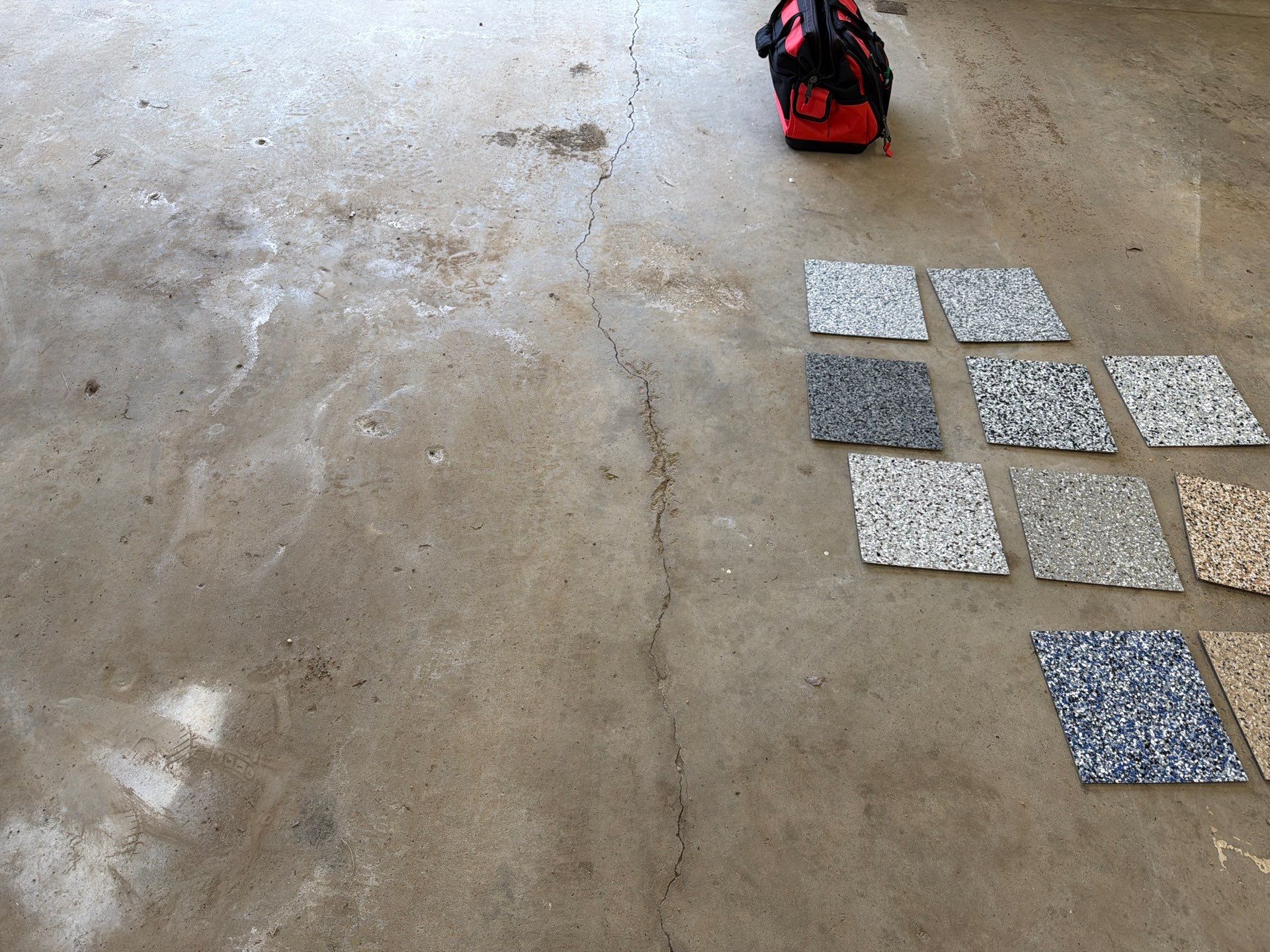 Feather Grey Garage Floor Coating and Crack Repair in Beresford by Select Painting, Coatings & Garage Cabinets