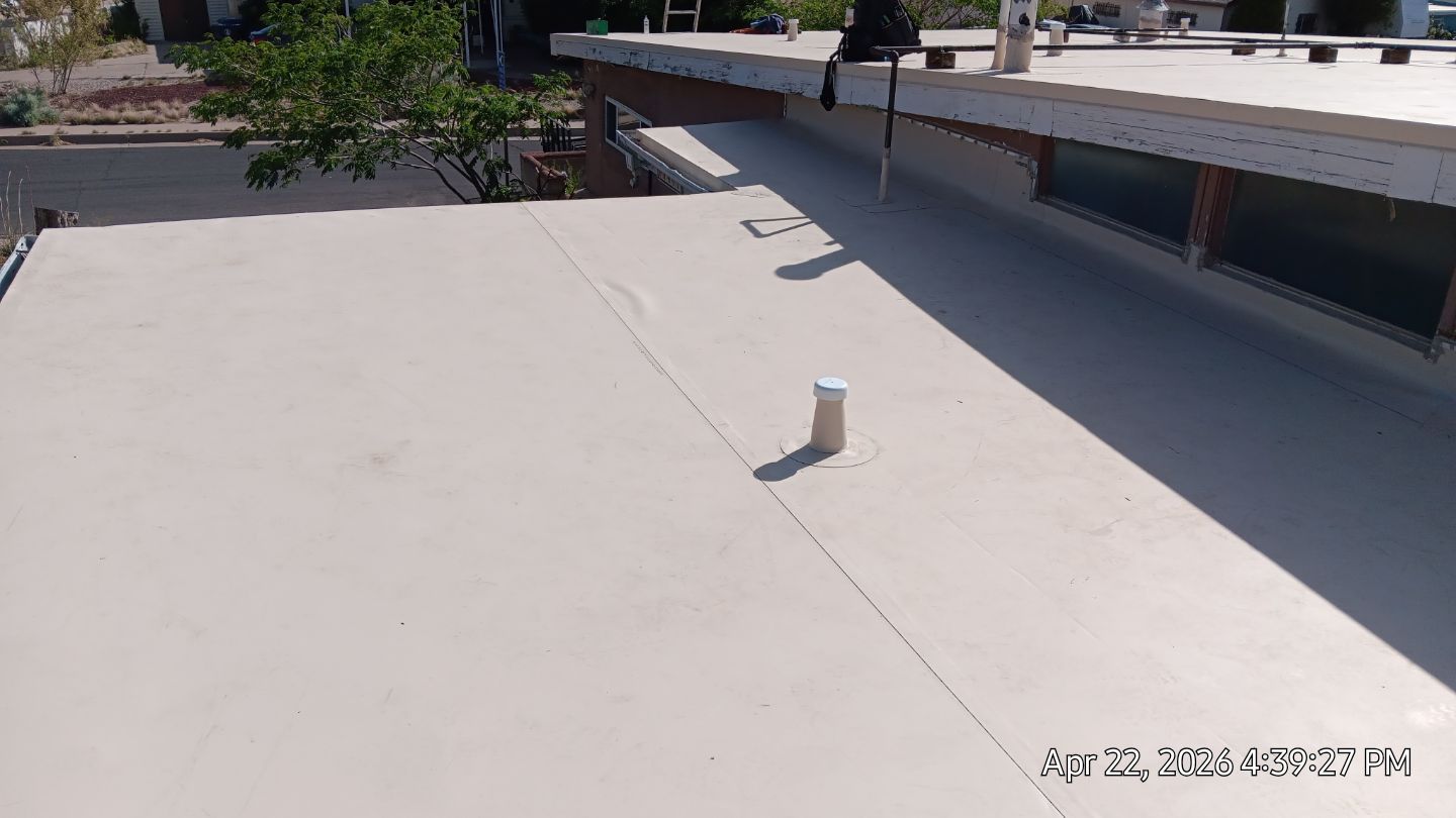 Residential TPO Roof Replacement and skylight replacement in Albuquerque by Doyle Roof Masters Inc
