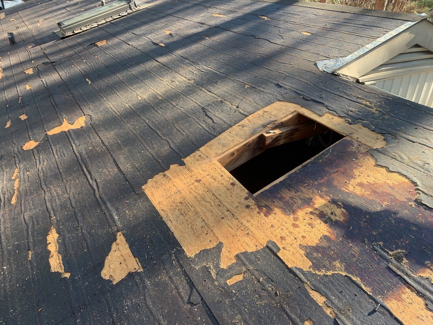 Re Roof by American Roofing NC