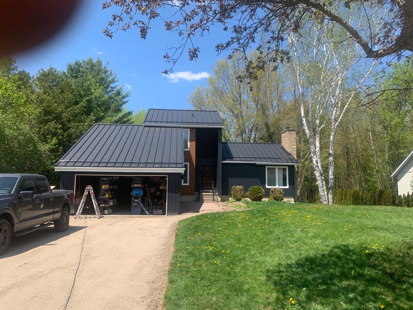Residential Roofing Installation using 16" Standing Seam Panels by Jay Carter Roofing & Sheet Metal