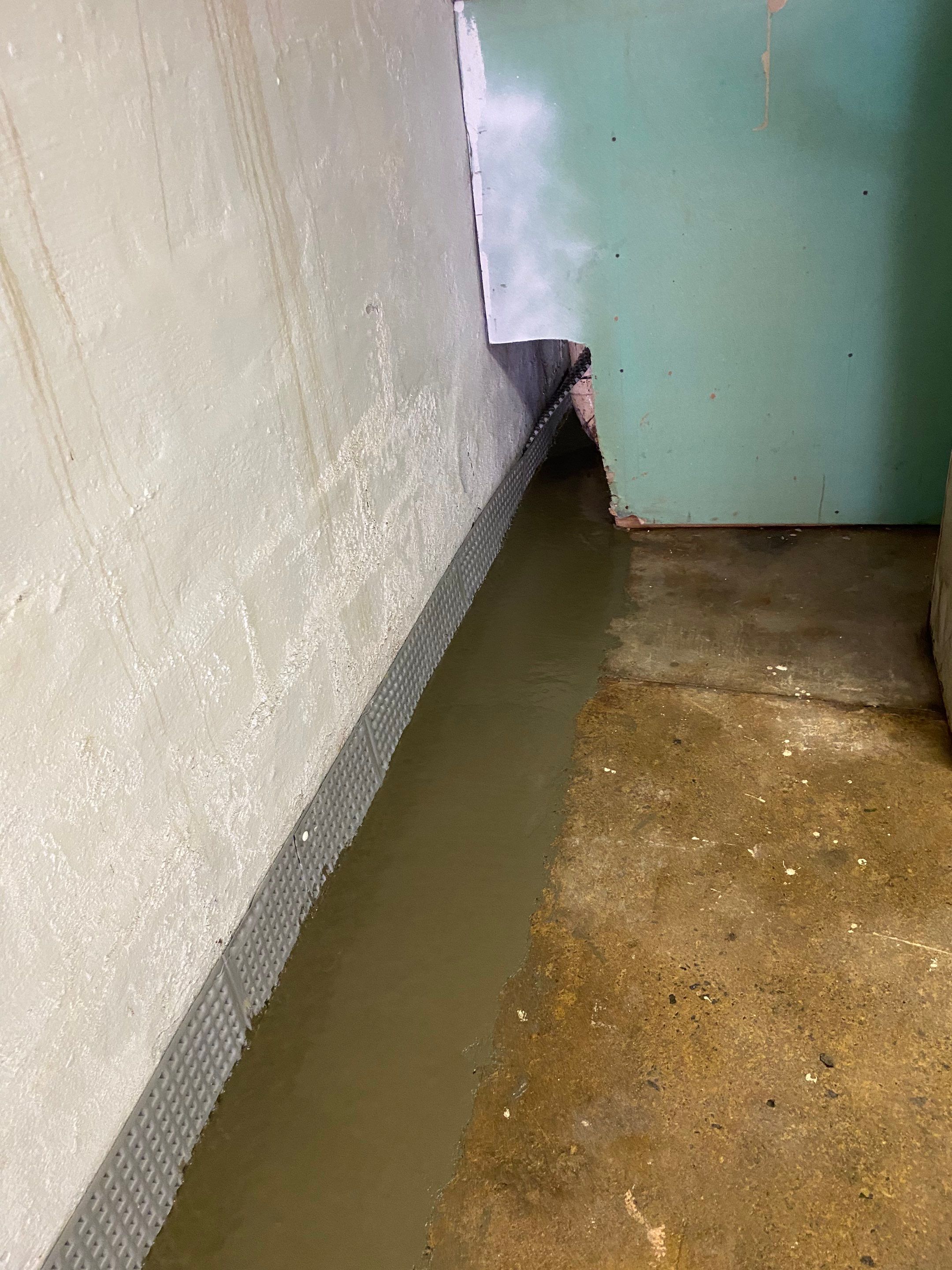 Interior French Drain Job in Bayonne, NJ by Pure Service Pro, LLC 