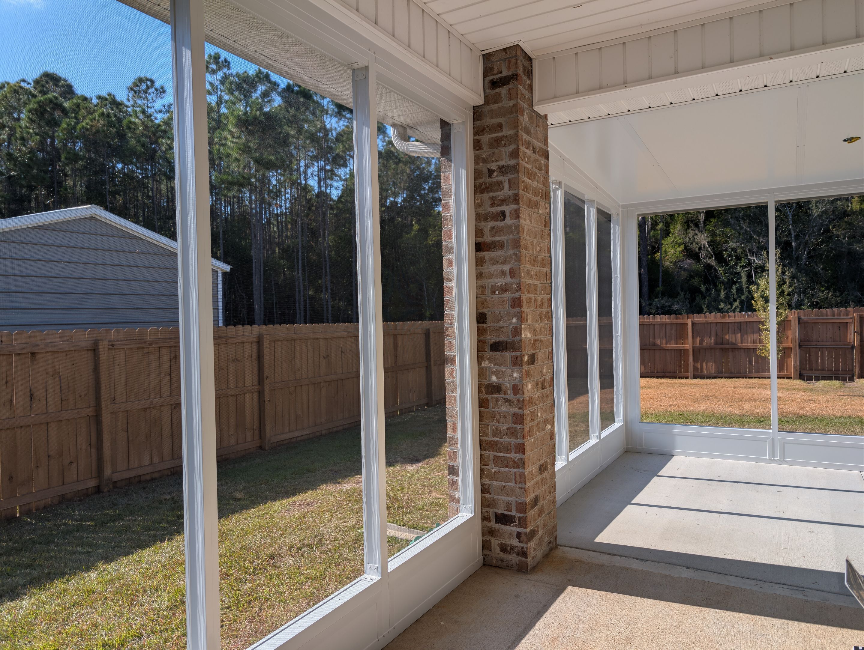 Home addition w/Vinyl 4-Track Windows by Titan Sunrooms