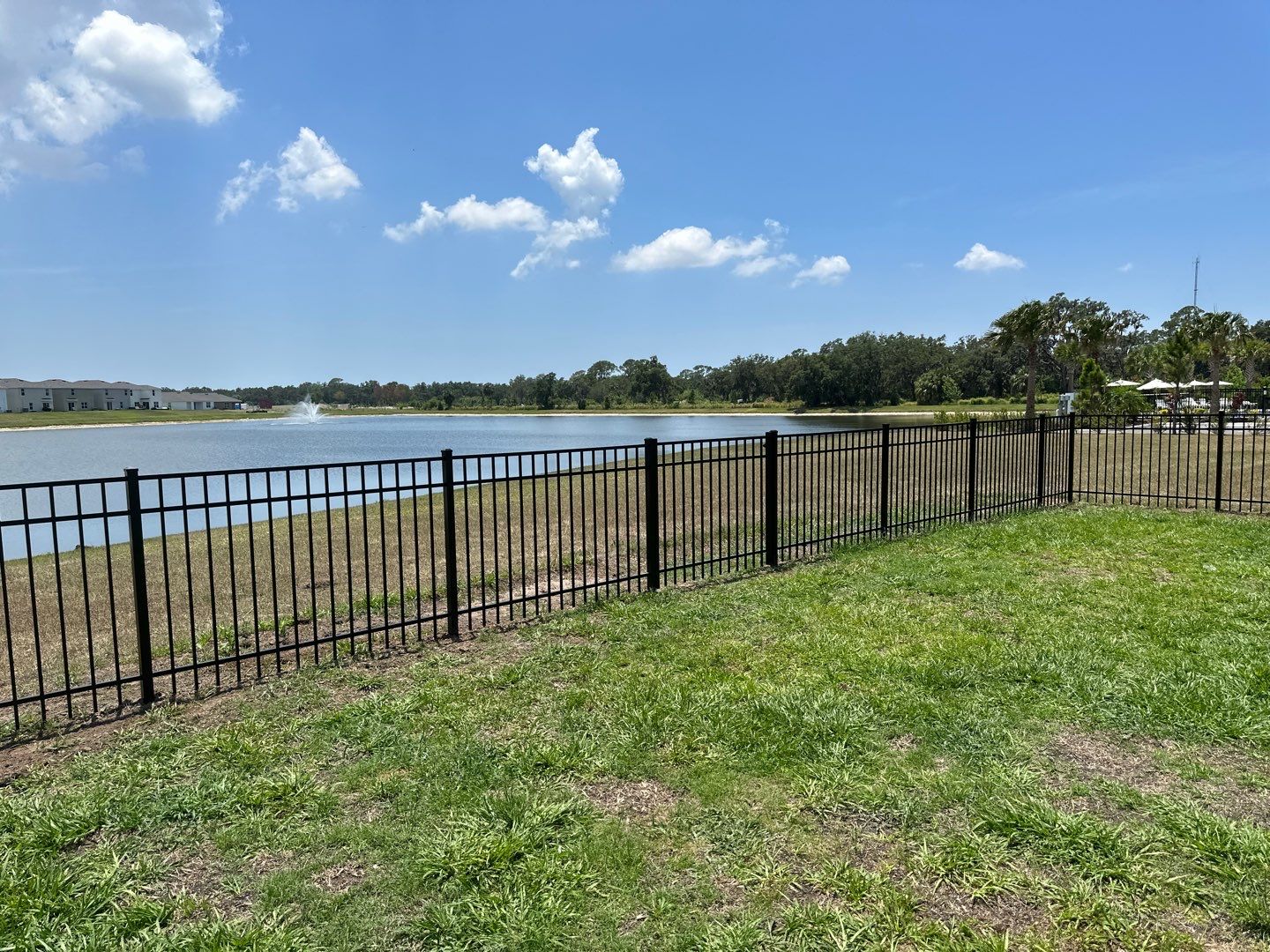 Aluminum Fence Installation using Black 3 Rail Aluminum Fence and Tan Vinyl Privacy Fence by Asap fence and gates, LLC