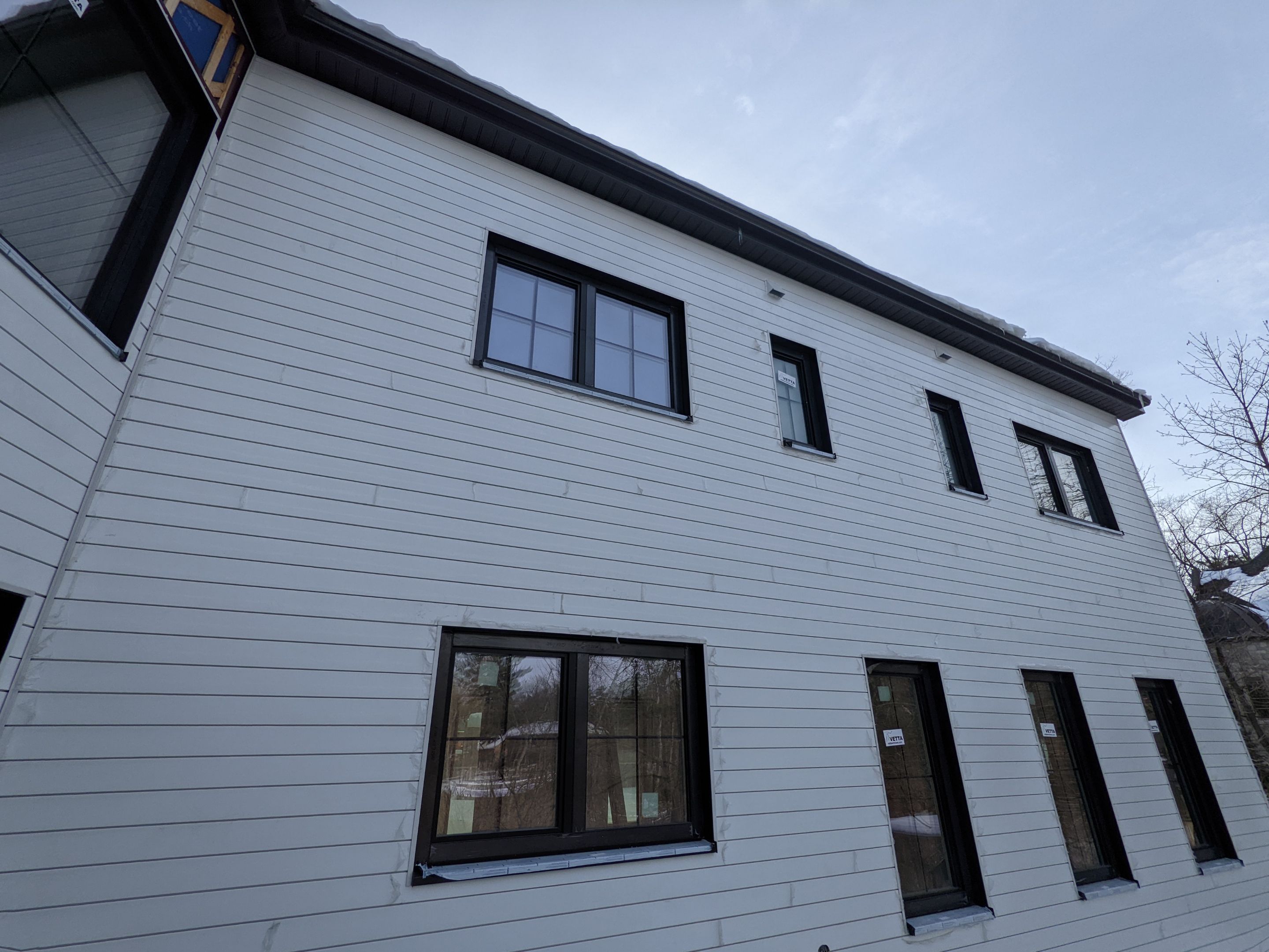 New Home Construction using 16" Standing Seam Panels by Jay Carter Roofing & Sheet Metal