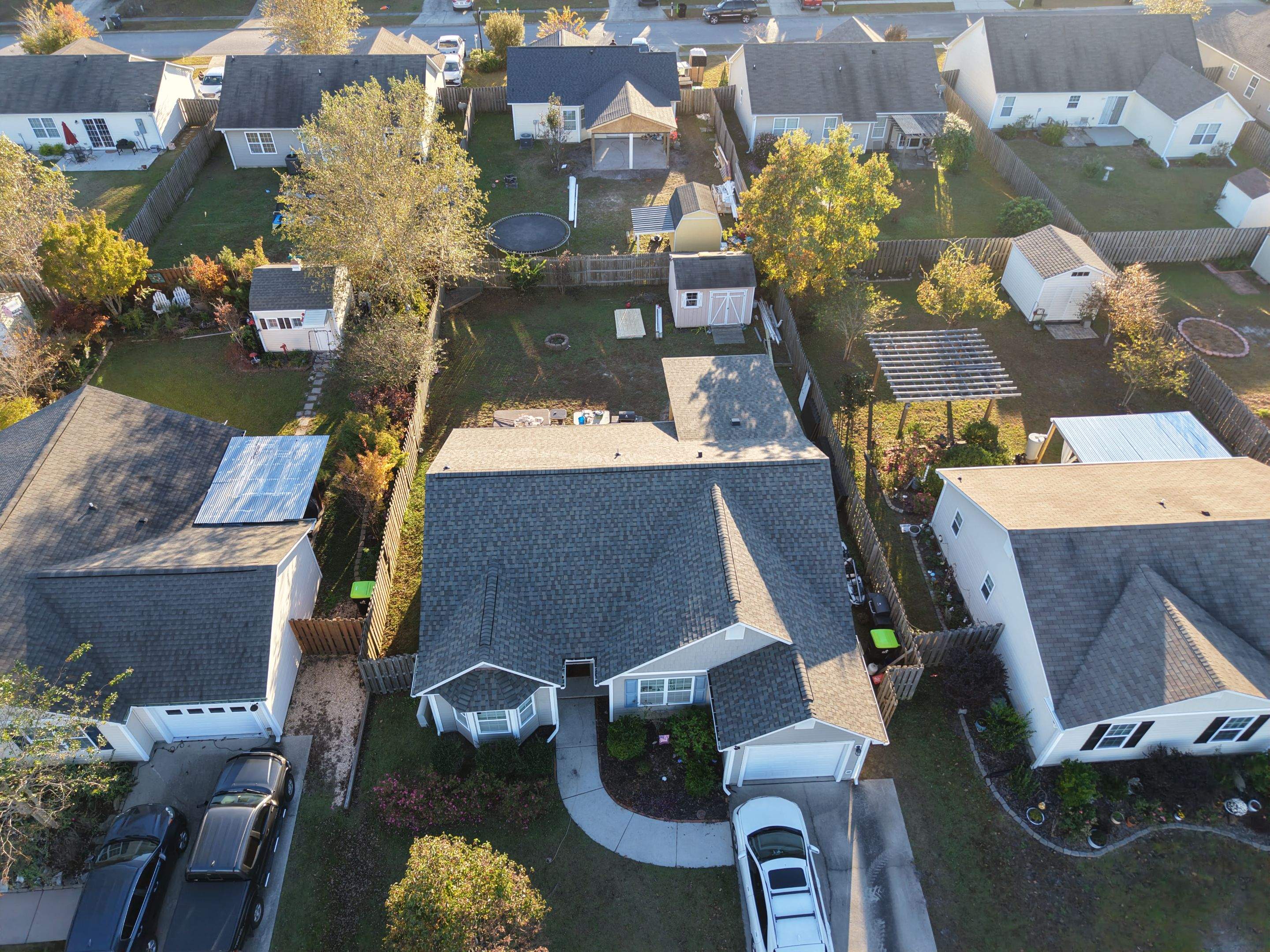 Covered Porch Build and Fortified Roof Replacement with Solar Panels by RGR Construction and Roofing, LLC