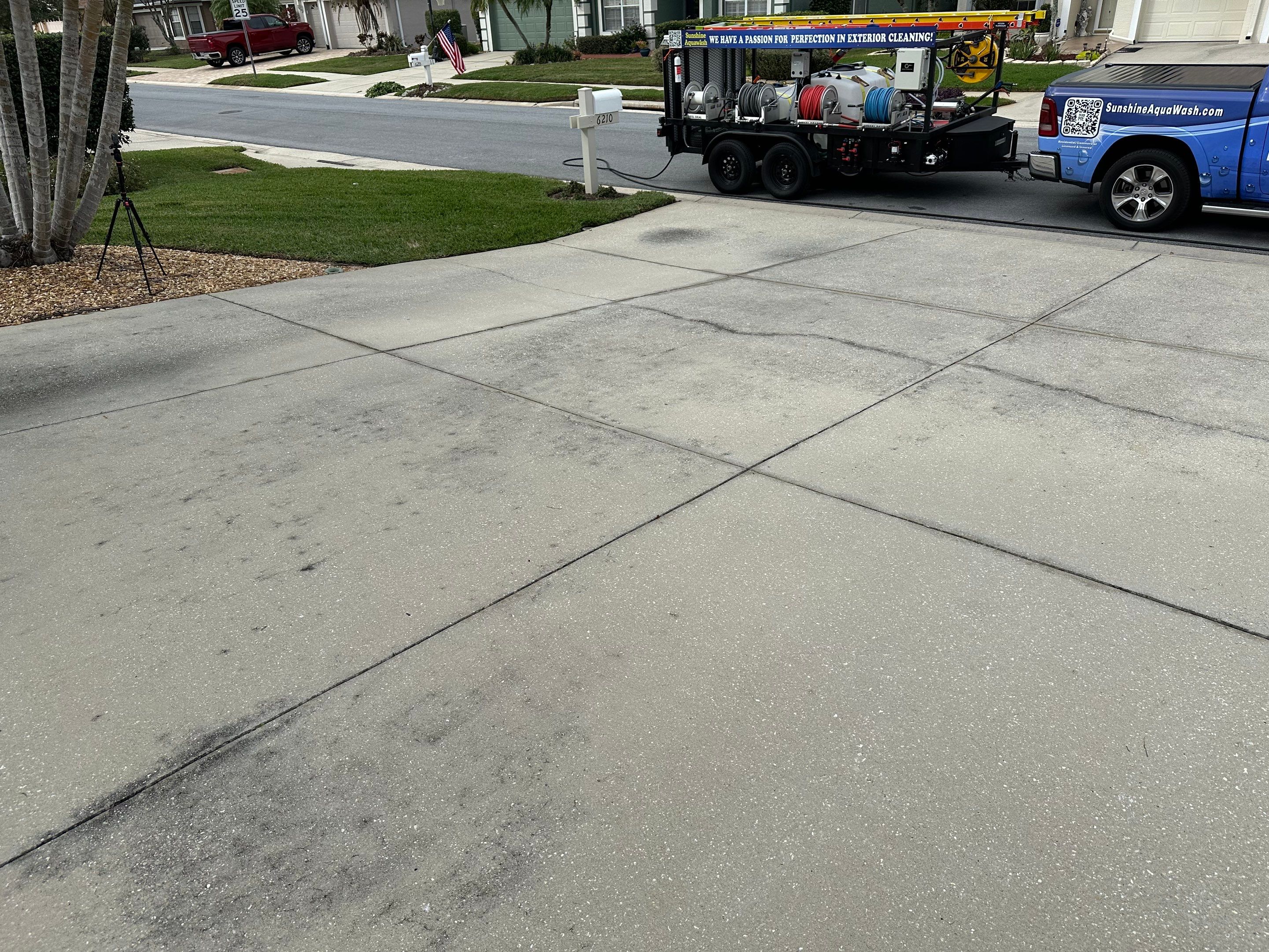 Concrete Driveway, Entryway & Street Curbing Cleaning in Fairways at Imperial Lakes, Palmetto, FL | Sunshine AquaWash by Sunshine AquaWash