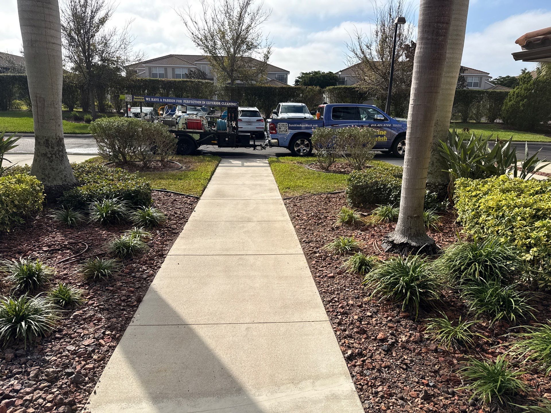 HOA Condo Concrete Driveway & Sidewalk Cleaning – River Strand Community, Bradenton, FL by Sunshine AquaWash