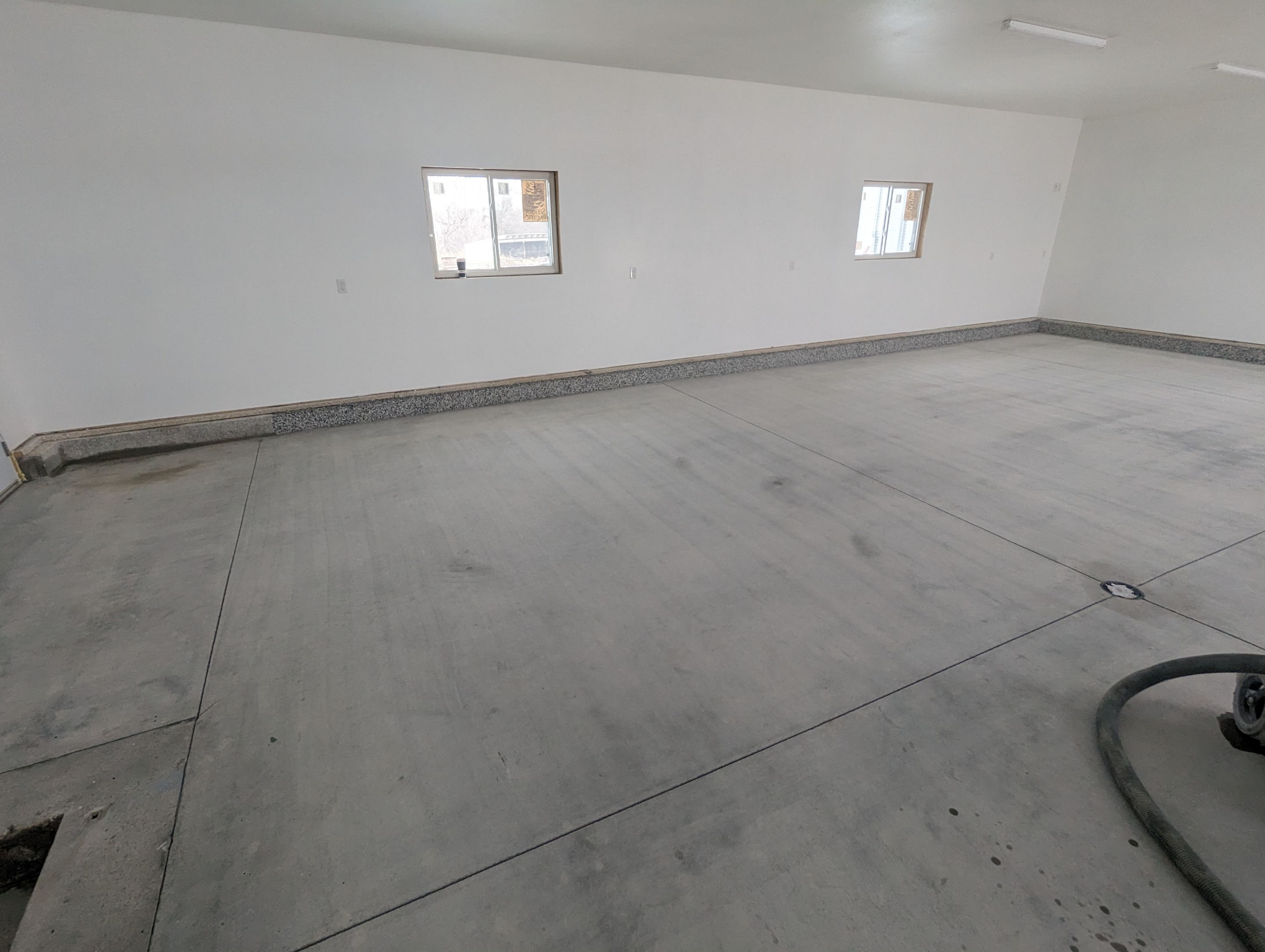 Garage using Domino  by Select Painting, Coatings & Garage Cabinets