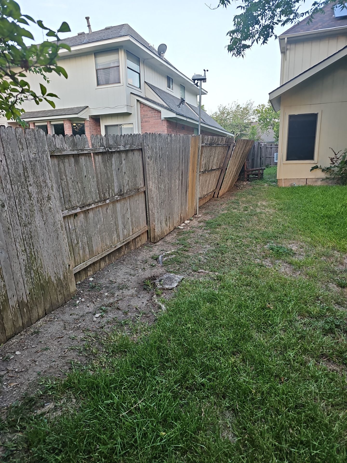 Fence Installation using Cedar Pickets by DeZign Roofing & Exteriors