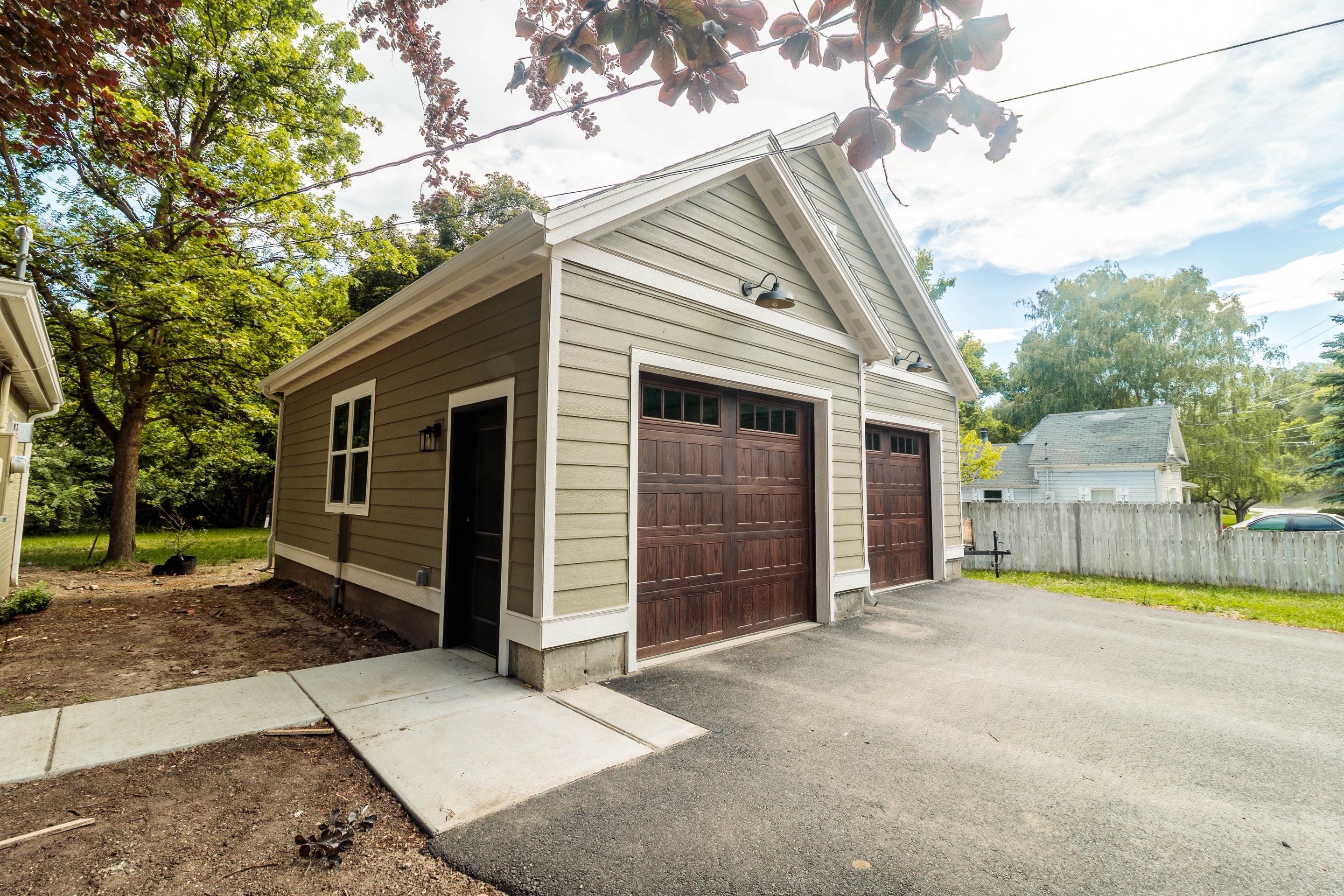 Henderson - Exterior re-cover by Garner Construction