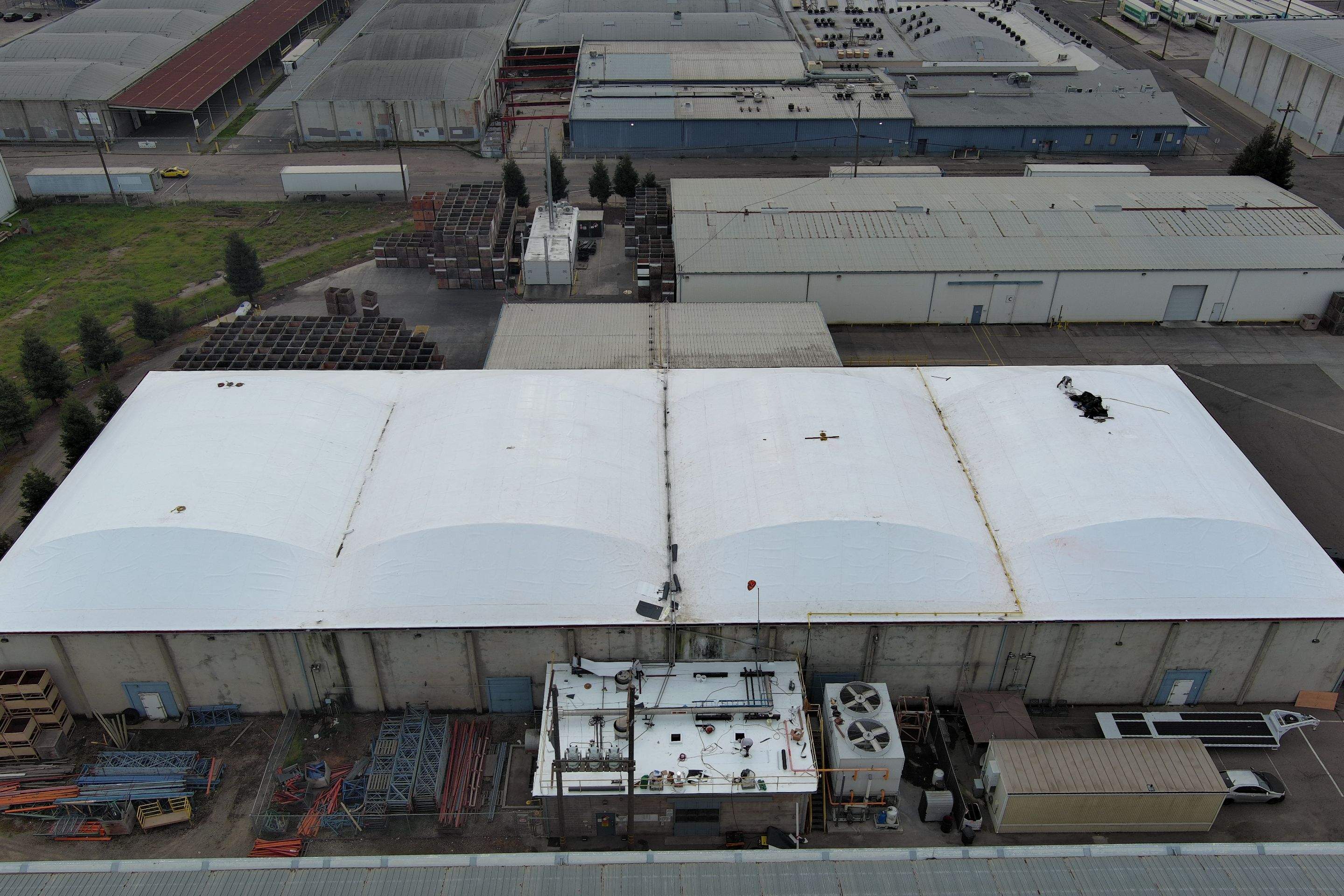 TPO single-ply roofing system using GAF Single-ply TPO 60 mil with 1.5 inch ISO board insulation by Straight Edge Roofing Inc