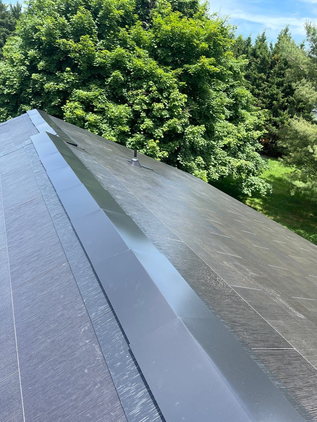 Tesla Solar Roof Installation by American Home Contractors