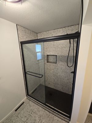 Fragmento tile bathroom floor and shower walls