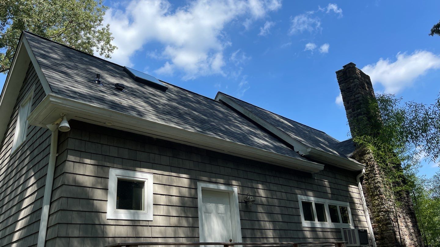 Roof Replacement using IKO Dynasty by American Home Contractors