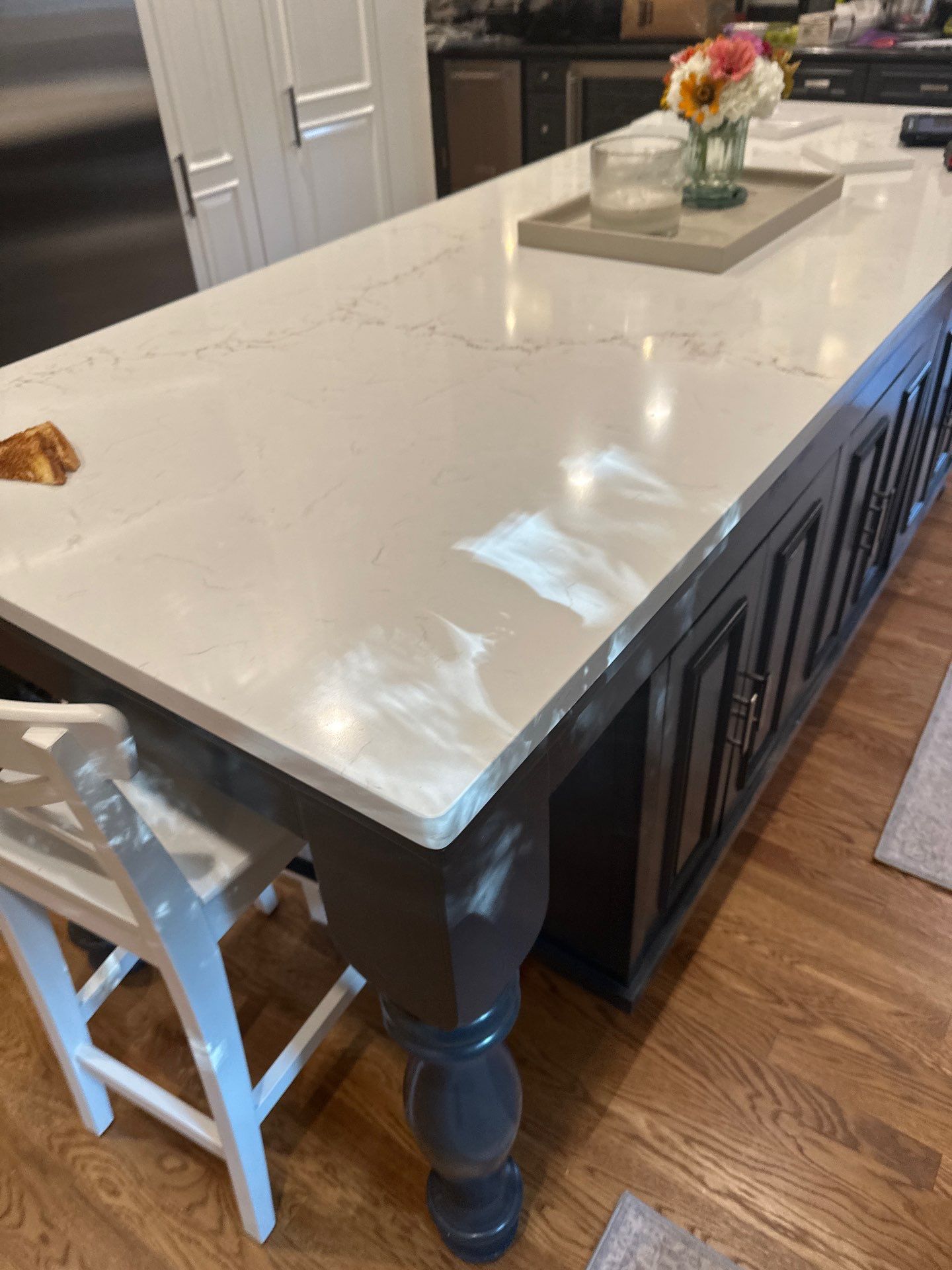 Kitchen countertops using Mysterio Gold Vicostone by Mena stone surfaces