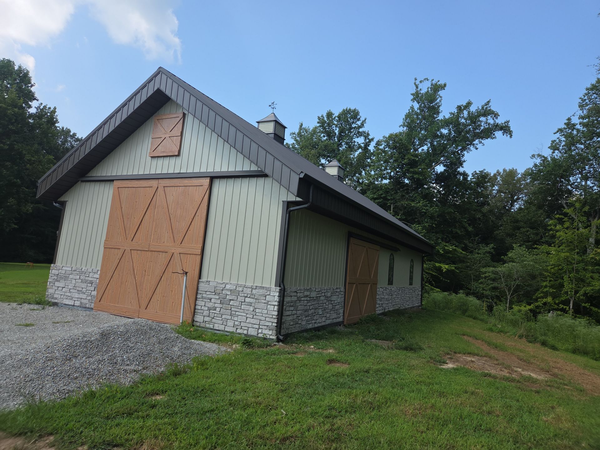 Pole Barn by The Barn Builders 