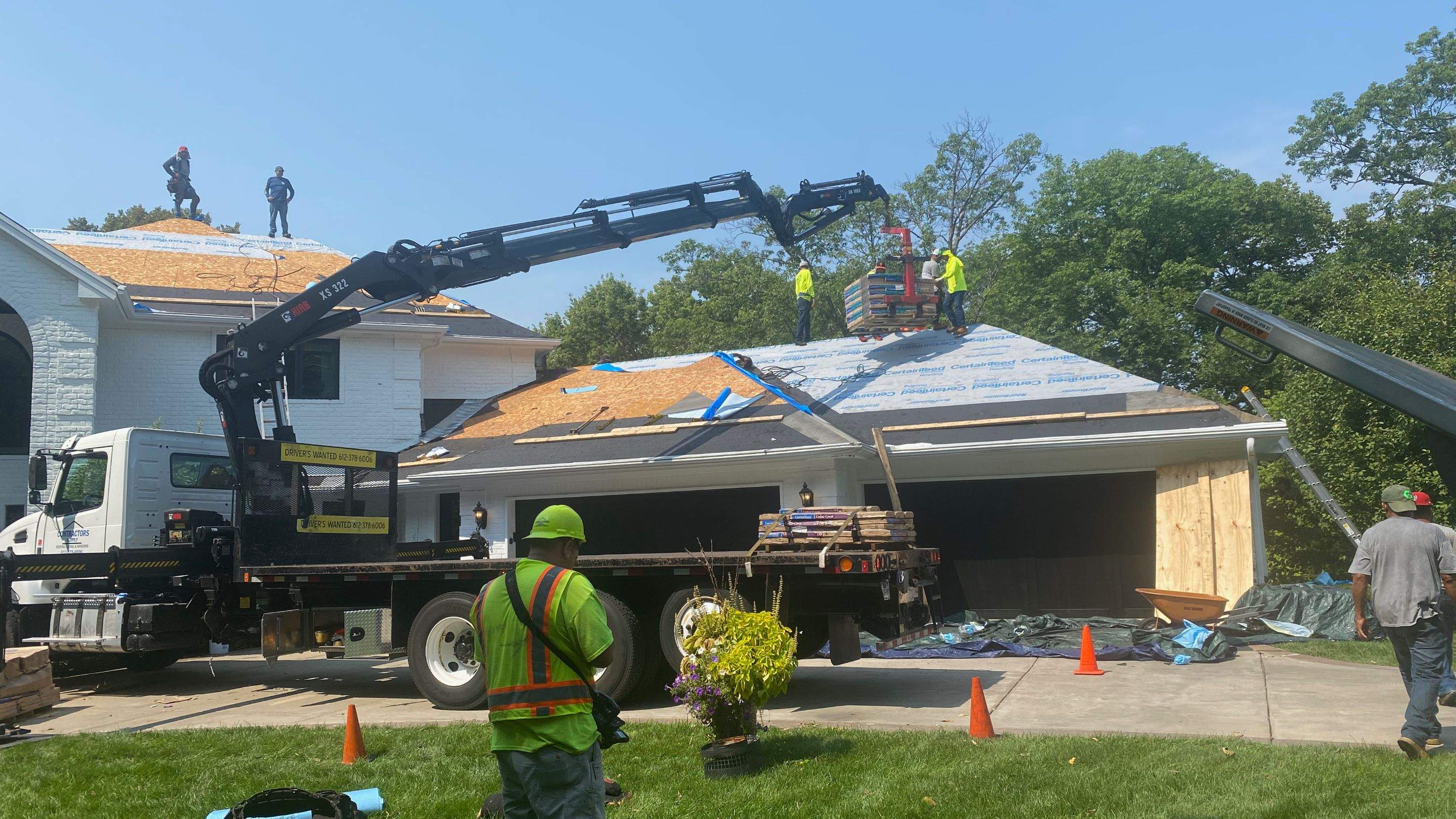 Residential Roofing Installation using Certainteed Landmark Moire Black by MODERN EXTERIOR SYSTEMS