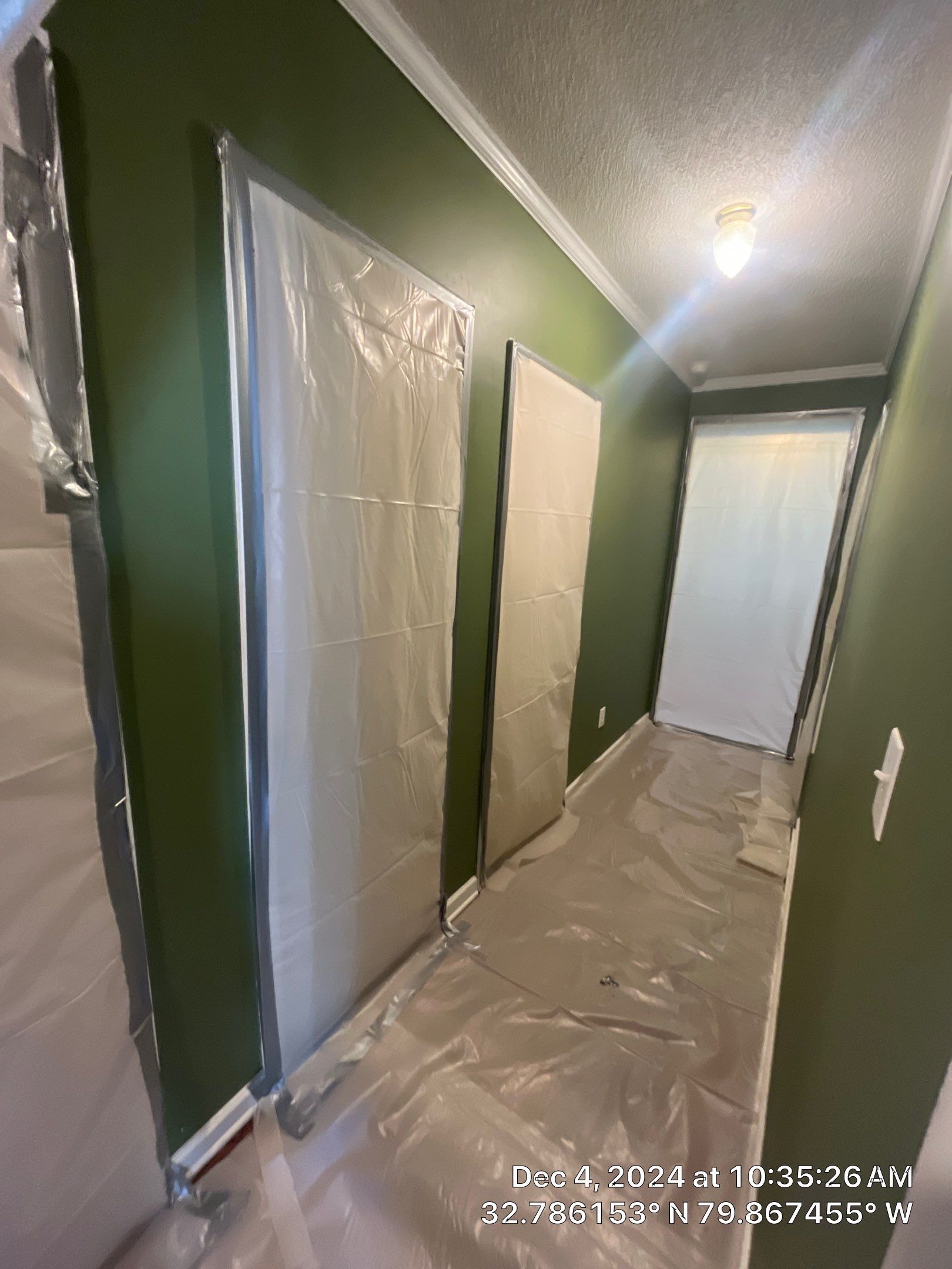 Abatement level clean of non-ACM vermiculite insulation by EAS Environmental, LLC.