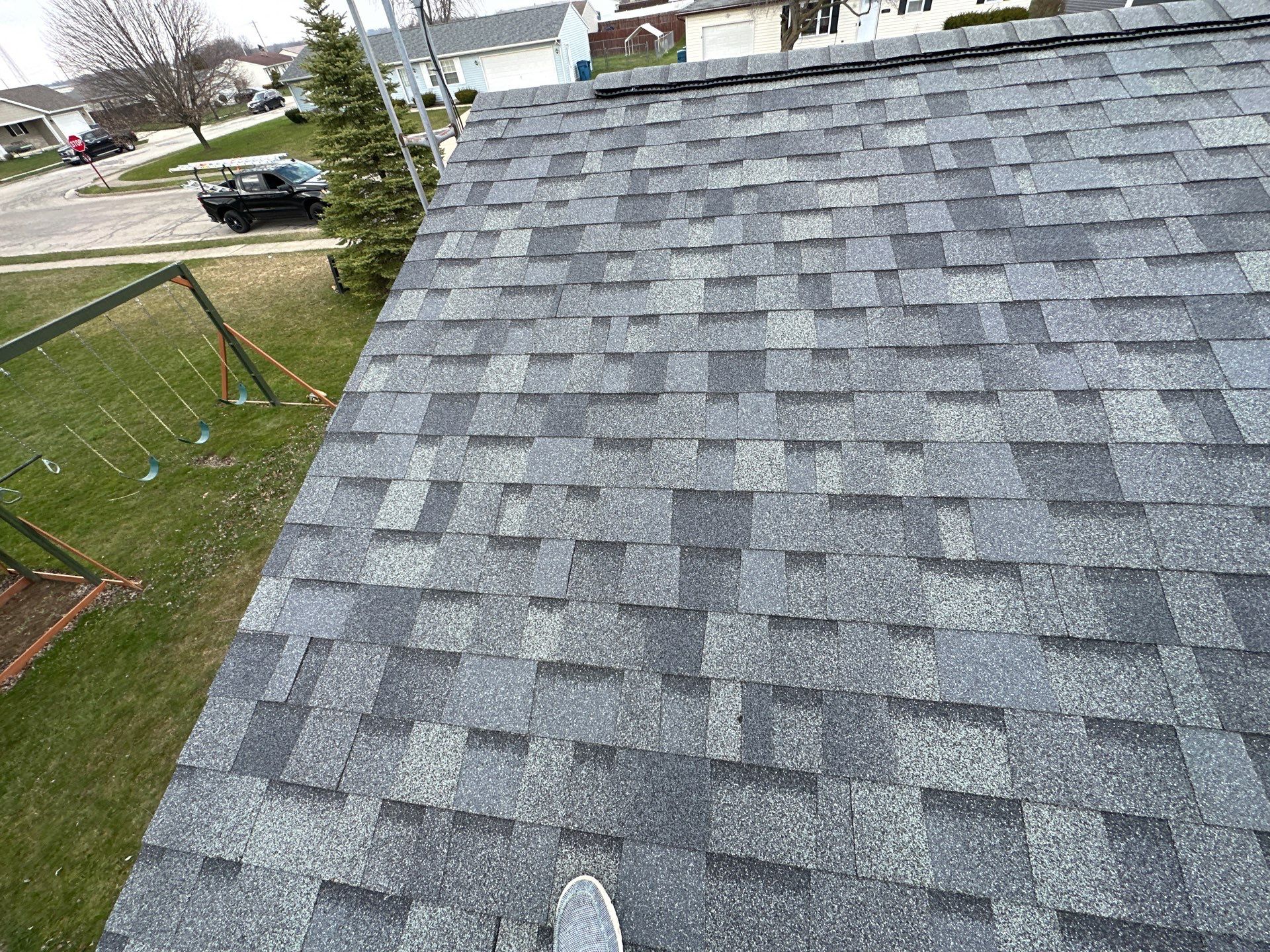 Storm Damage Residential Roof and Siding Installation by WIW Enterprises Inc