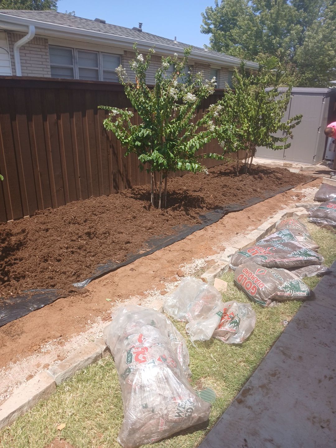Landscape using Crepe Myrtle Plant by Clays Services Inc