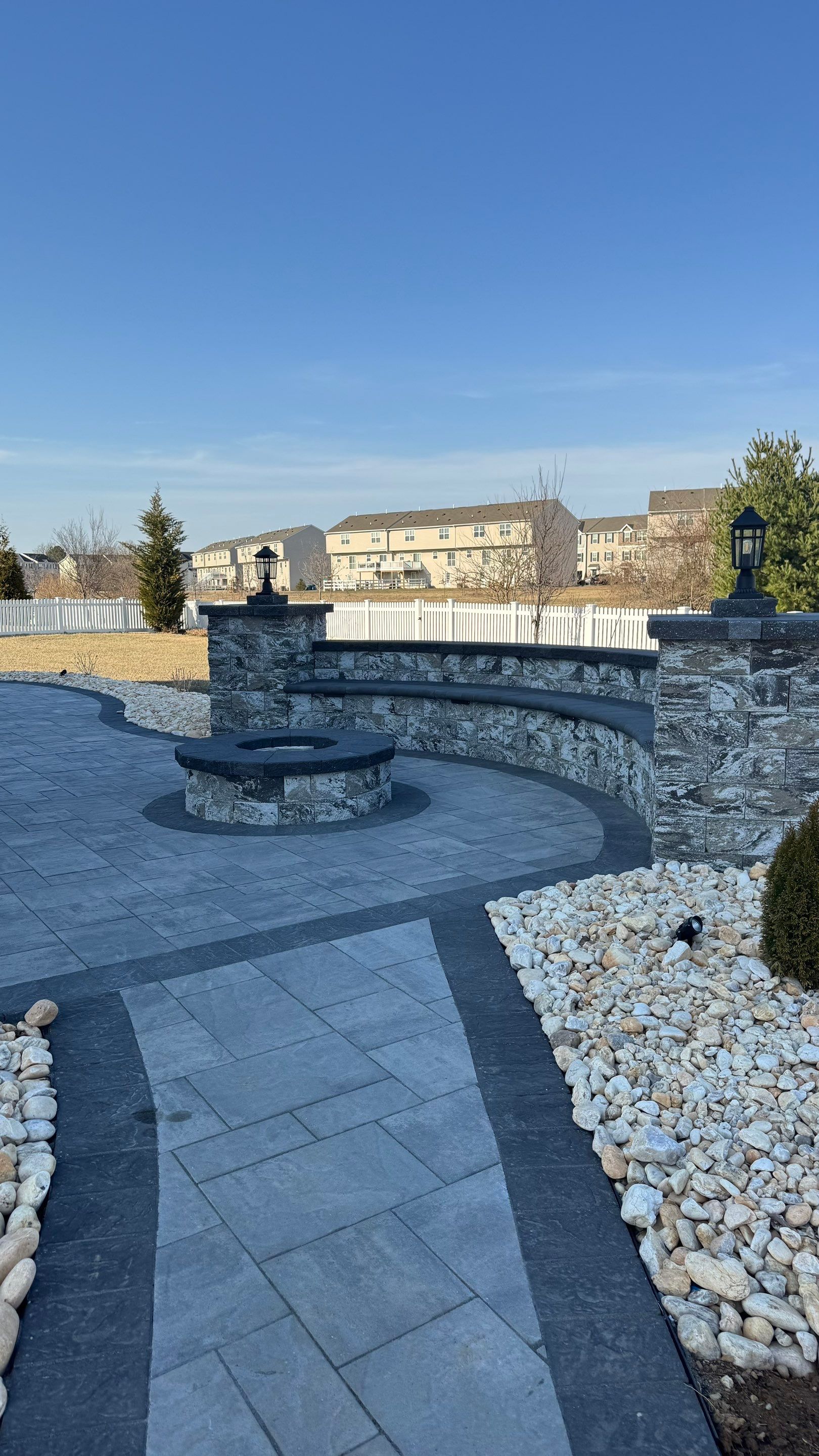Custom Belgard patio by Studio G Indoor Spaces & Outdoor Living