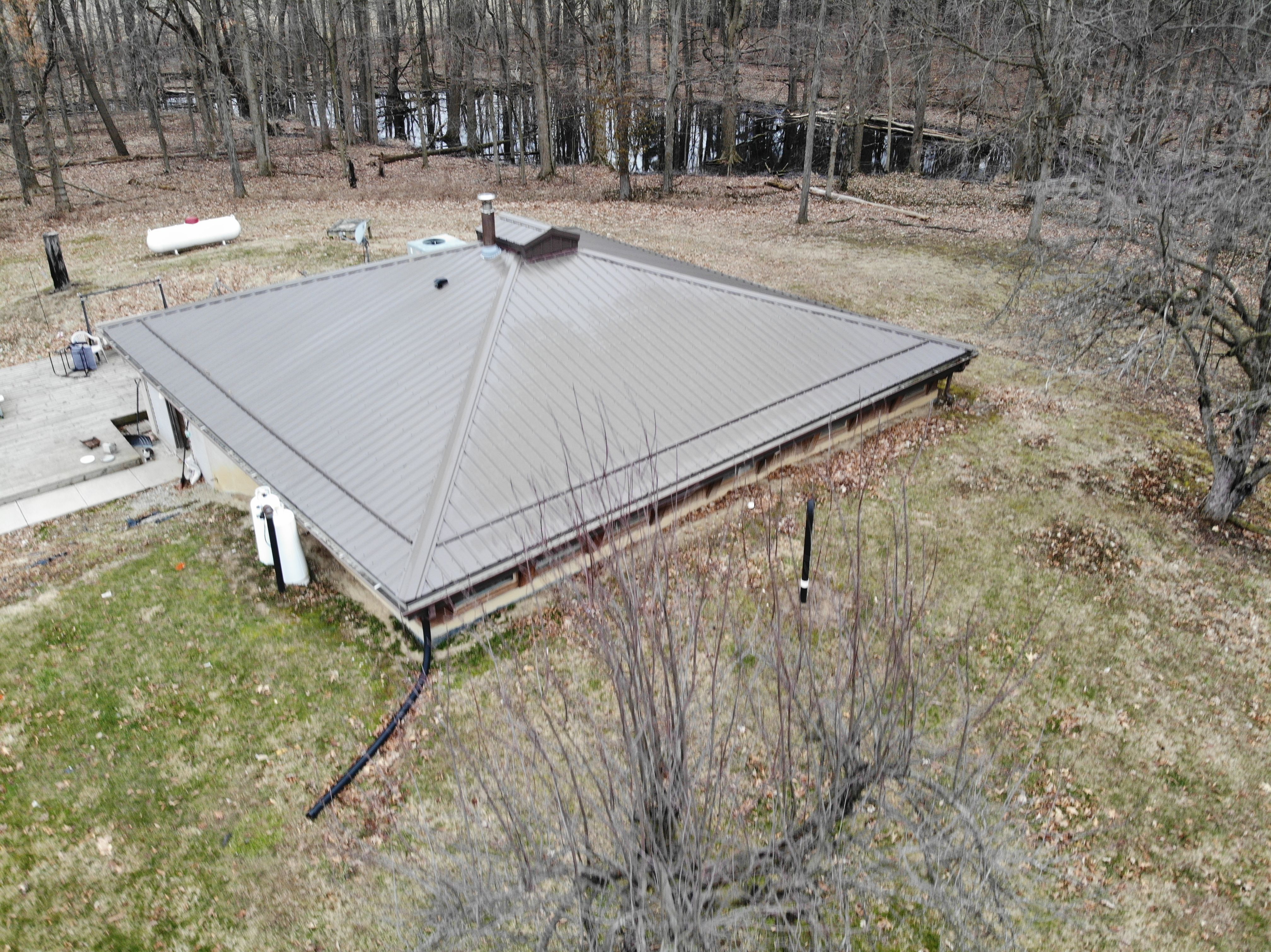 Exposed Fastener Metal Roof on Multi-Home Property in Columbia City, Indiana by 4Ever Metal Roofing