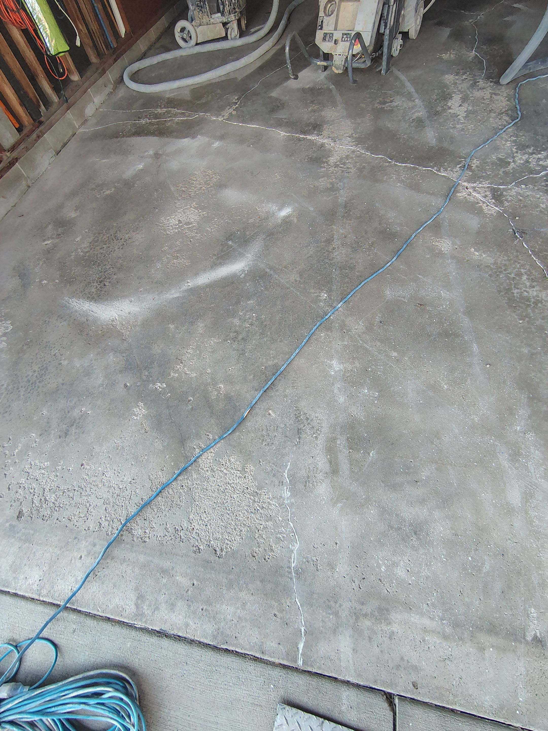 Sioux Falls Garage Epoxy Floor Installation and Concrete Crack Repair by Select Painting, Coatings & Garage Cabinets