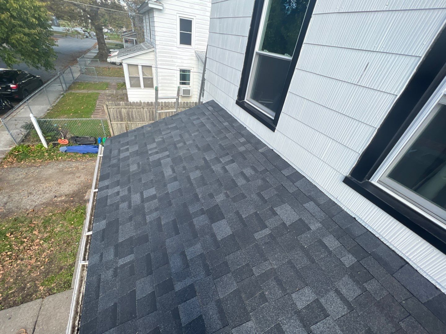 Onyx Black Shingles by Reimagine Roofing